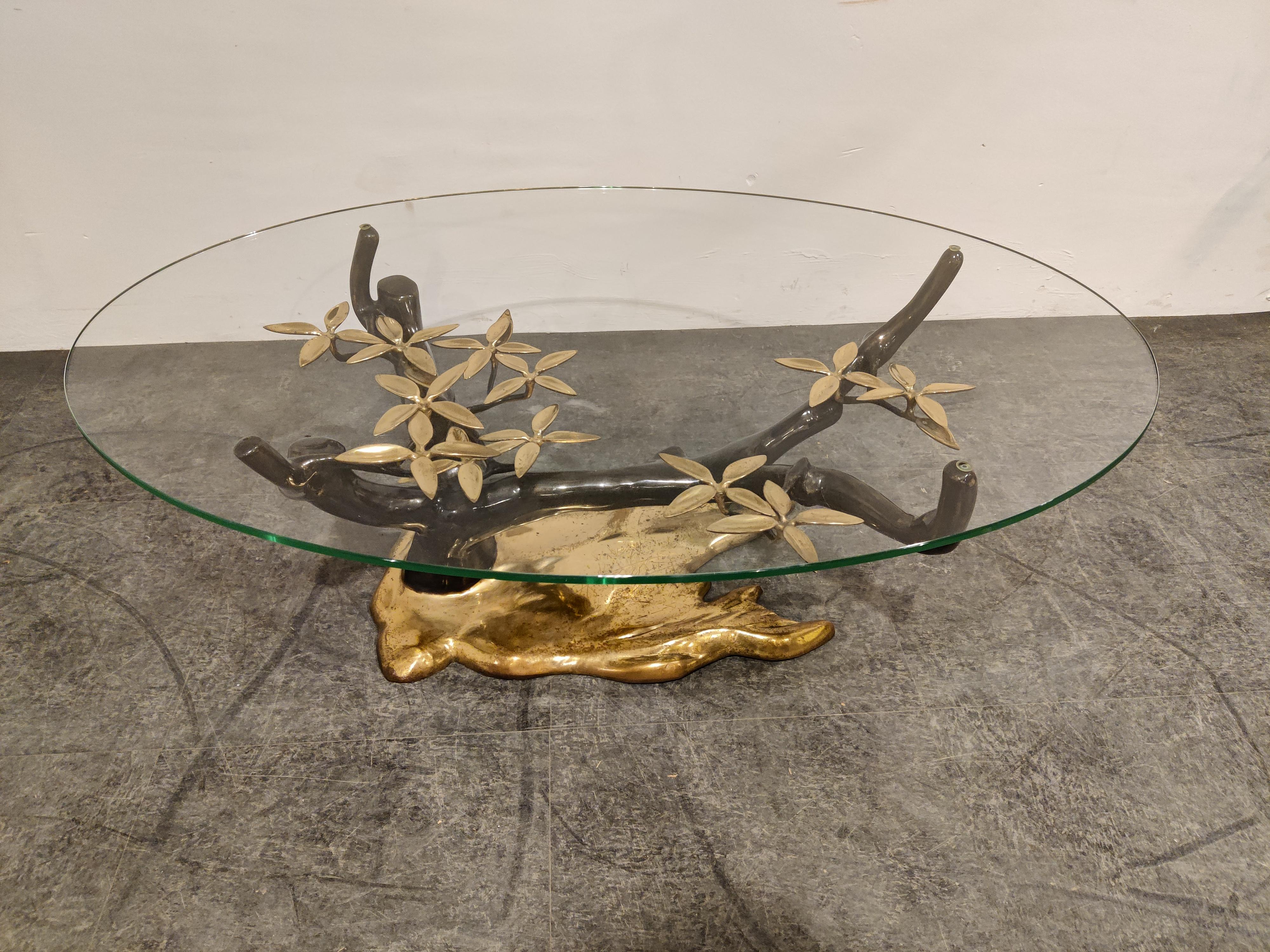 Bronze bonsai coffee table by Willy Daro.

Beautifully manufactured sculpture, comes with a clear glass top.

Slight patina, no damages,

1970s, Belgium

Dimensions:
Height: 42cm/16.53