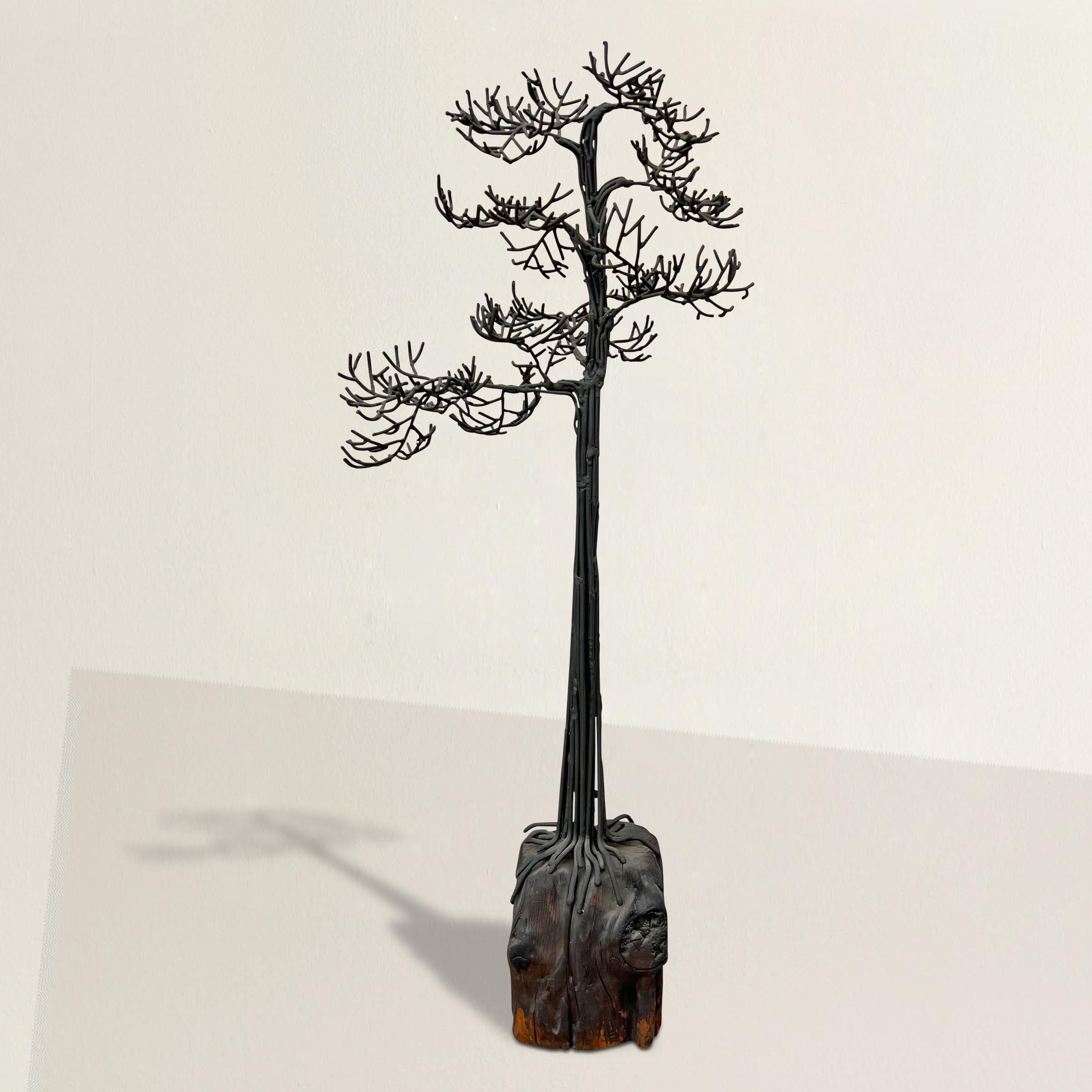 This mid-20th century Brutalist bronze bonsai tree sculpture, a masterful creation by the renowned American artist Belva Ball, stands as a testament to her influence within the Brutalist movement. Crafted from hundreds of meticulously welded bronze