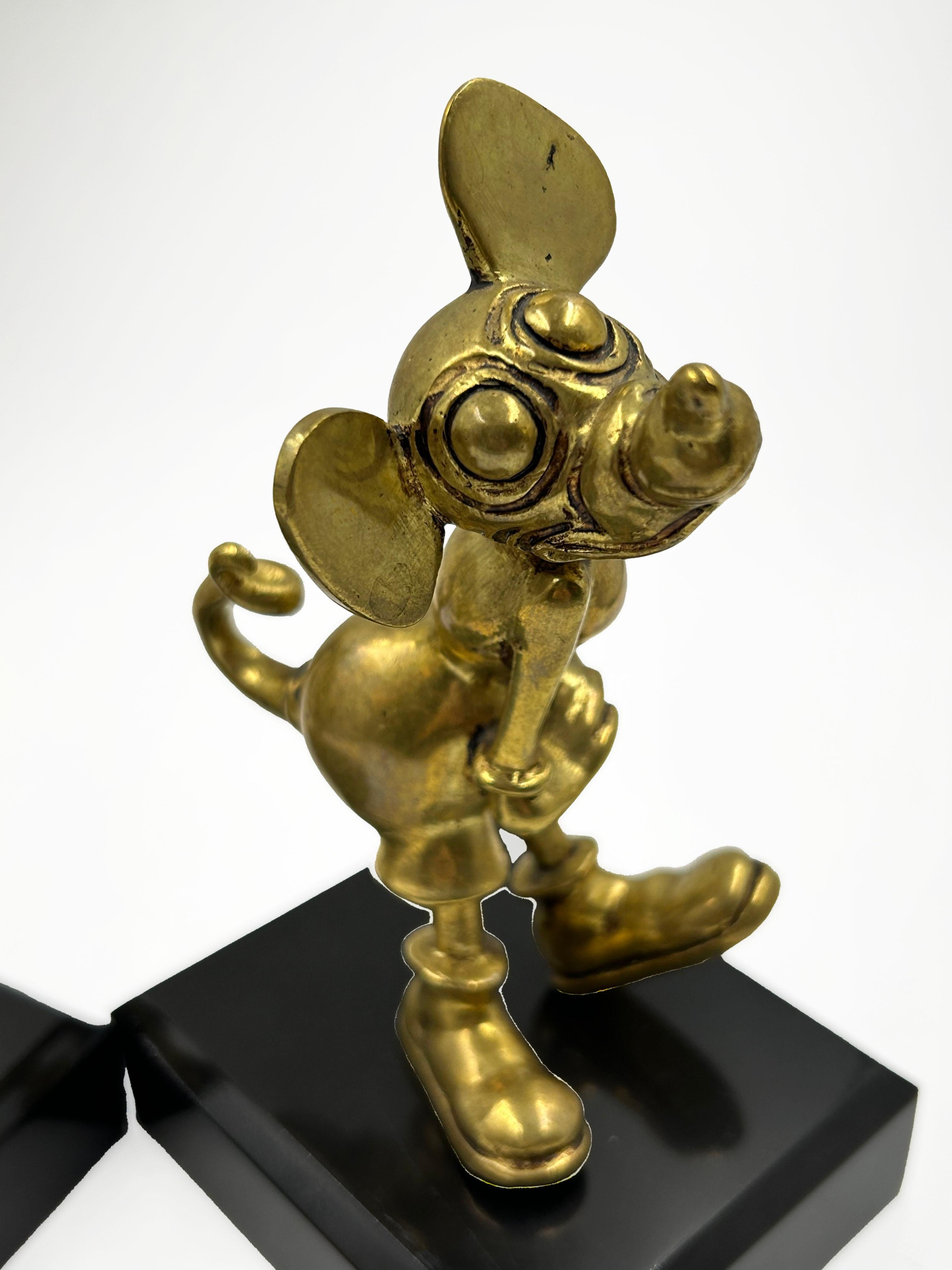 Art Déco Fermalibro in bronzo del caratteristico personaggio Disney, anni '30 in vendita
