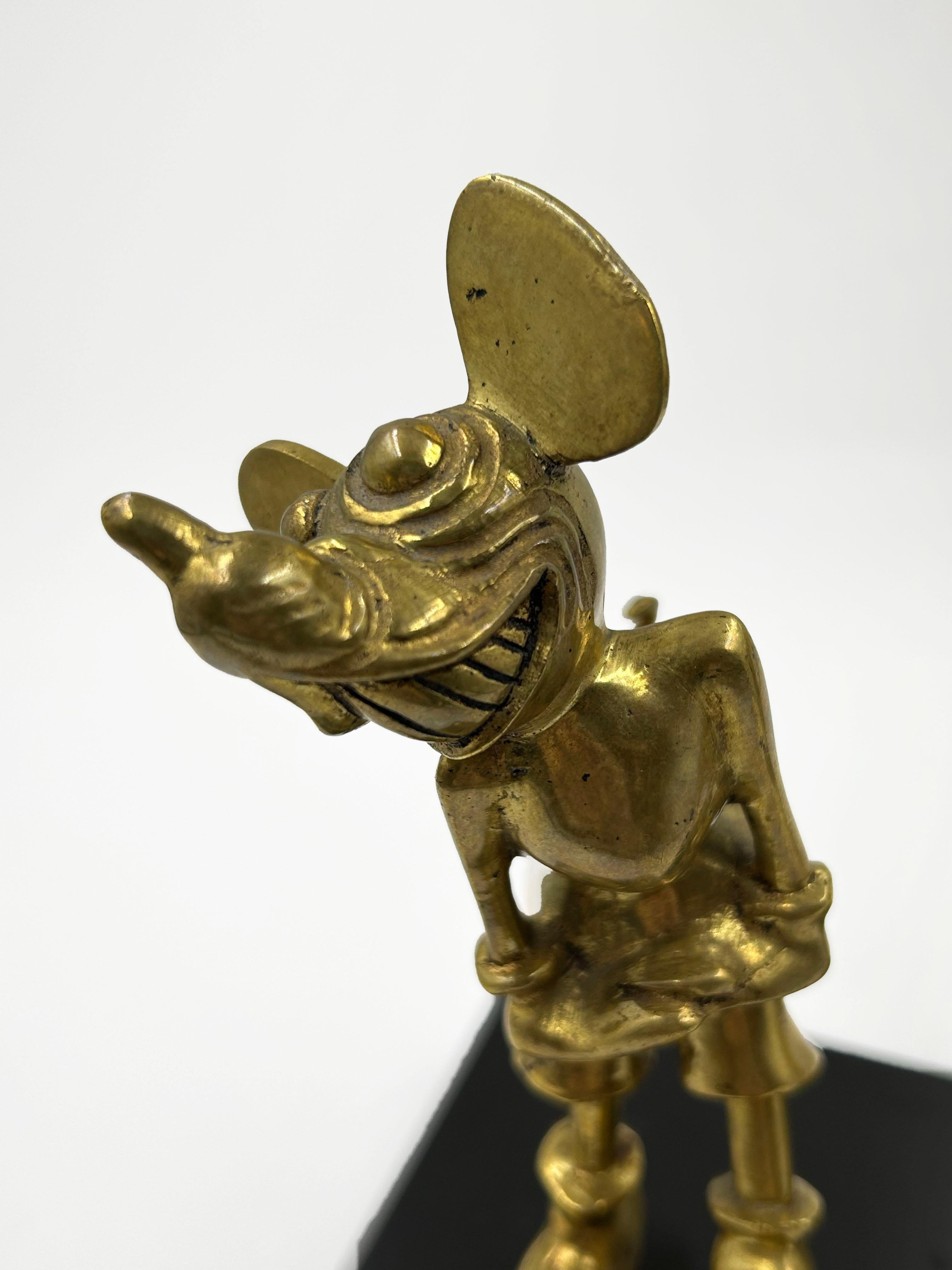 Americano Fermalibro in bronzo del caratteristico personaggio Disney, anni '30 in vendita