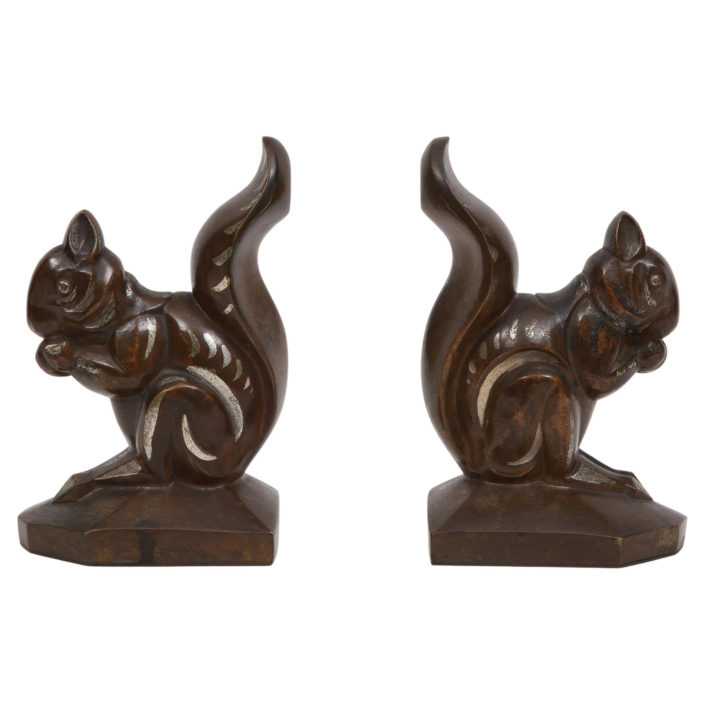 Bronze bookends by Louis Fontinelle