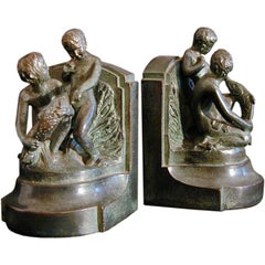 Antique Bronze Bookends with Motif of Boys and Fish