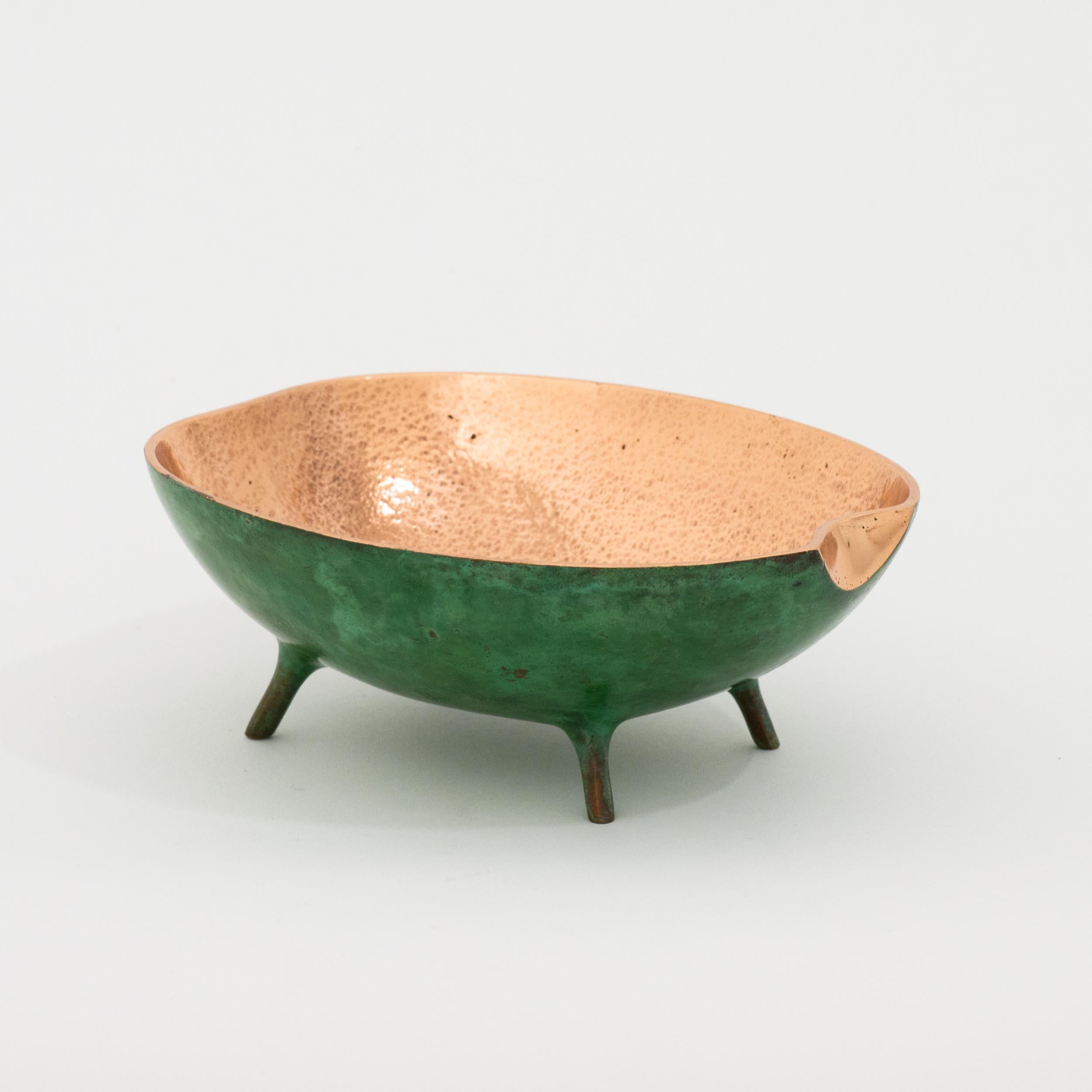 Charming and unusual handmade polished cast bronze bowl.

Each of these original and elegant bowl is handmade individually. Cast using very traditional techniques, the inside is polished and the outside is aged to show a beautiful copper green