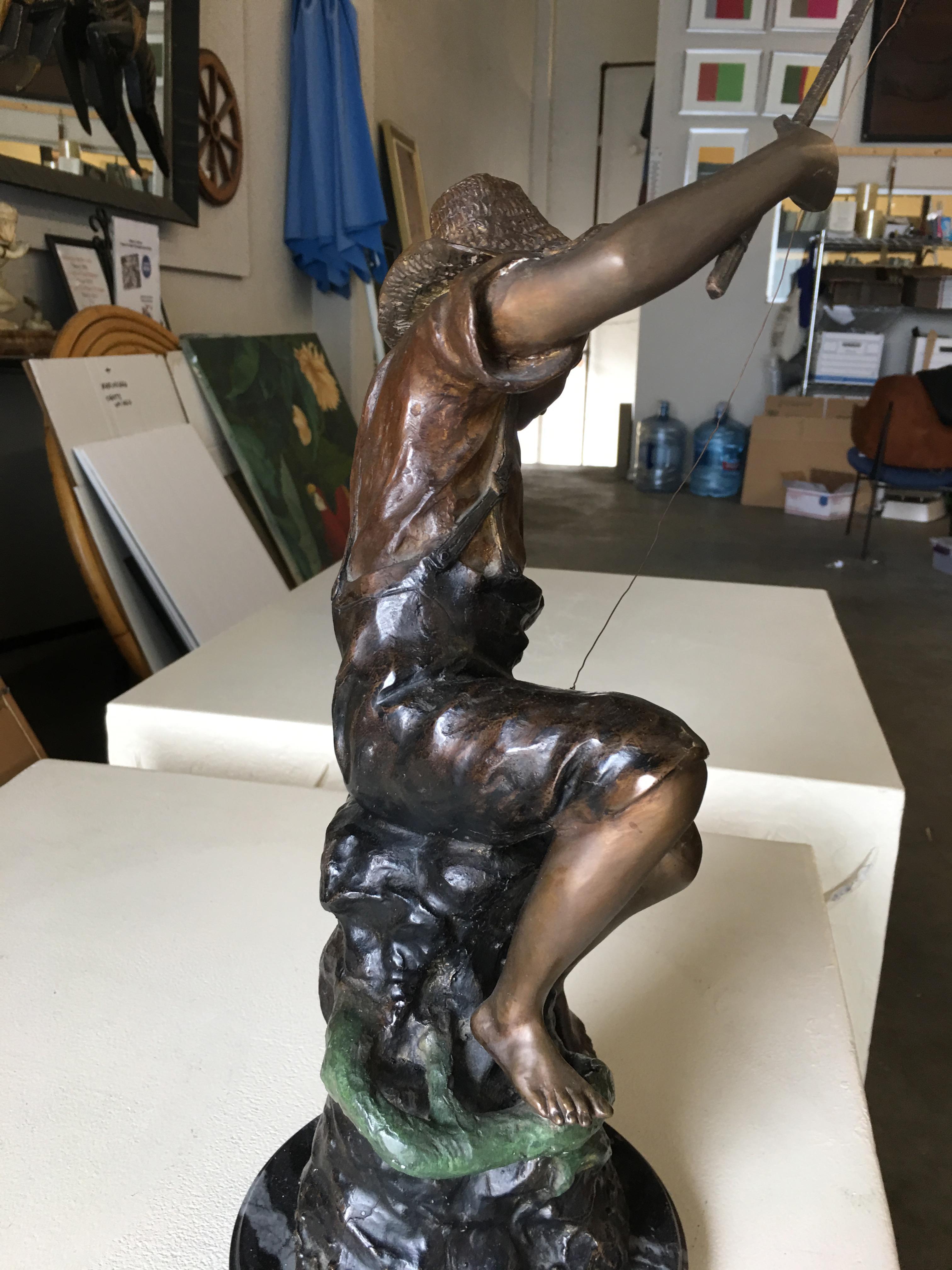 bronze fisherman statue