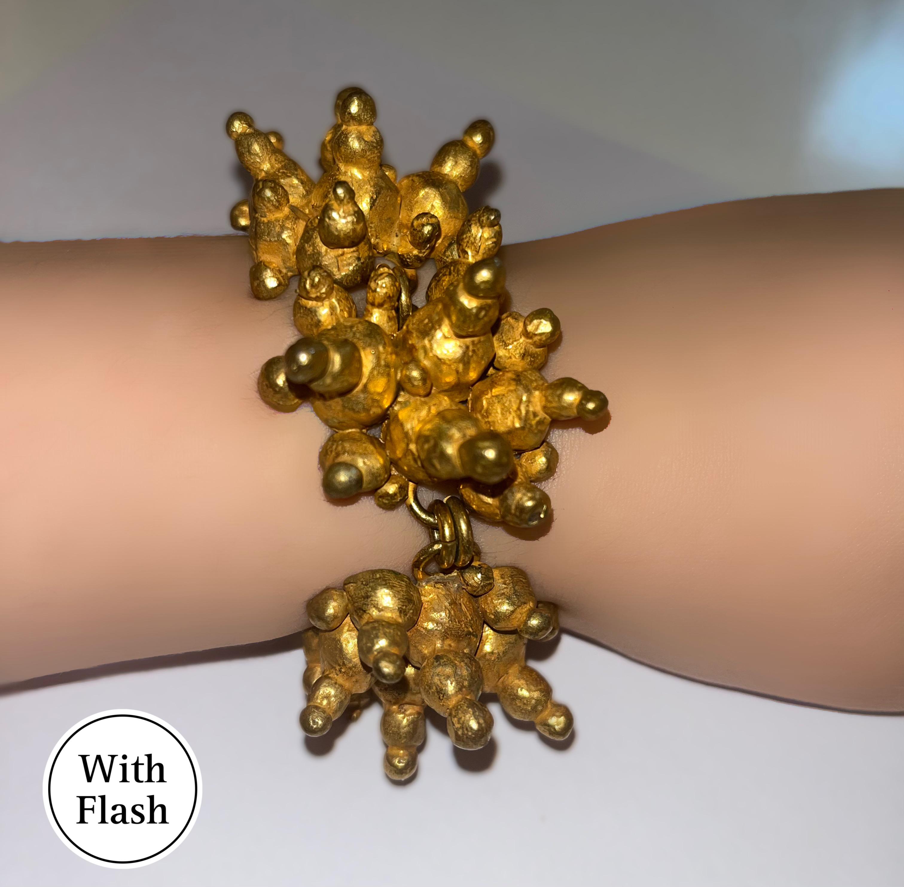 This unmatched piece of jewellery is something you do not want to miss. This bracelet made in bronze is signed by Hervé Van Der Straeten on the inside (see picture). The bracelet's design reflects the designer's unique and peculiar style. The