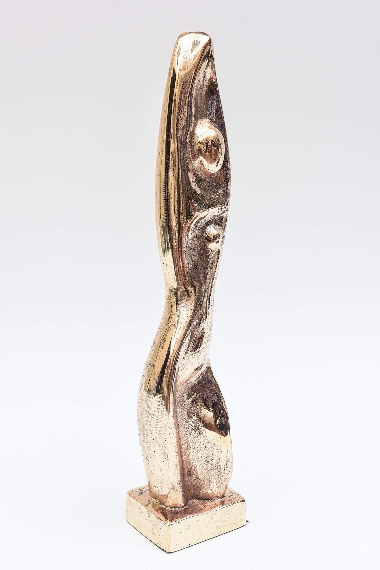 This very sensual heavy bronze sculpture is very Constantin Brancusi meets Jean Arp. it is an abstract meets figurative female form in repose and pose. It is restrained and elegant. There is a deep underlying sensuality to the bronze. The sculptor