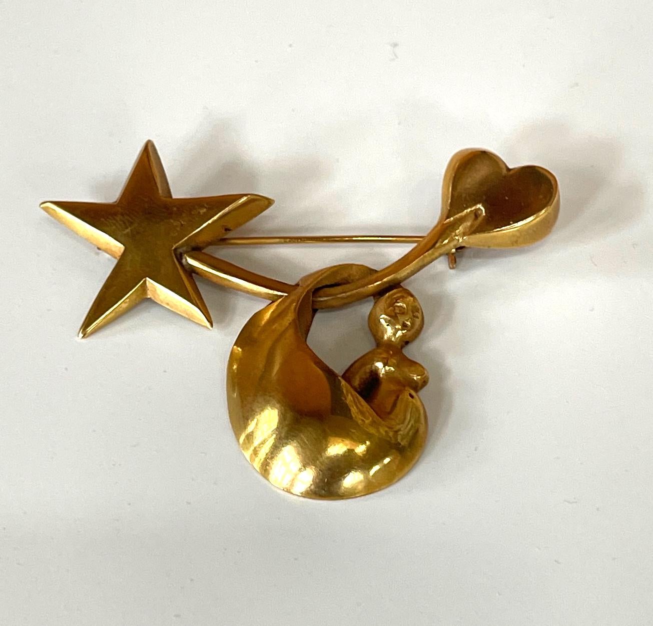 A lovely brooch in gilt cast bronze made by French Parisian art jeweler Line Vautrin (1913-1997) circa 1940s. The brooch belongs to a collection called 
