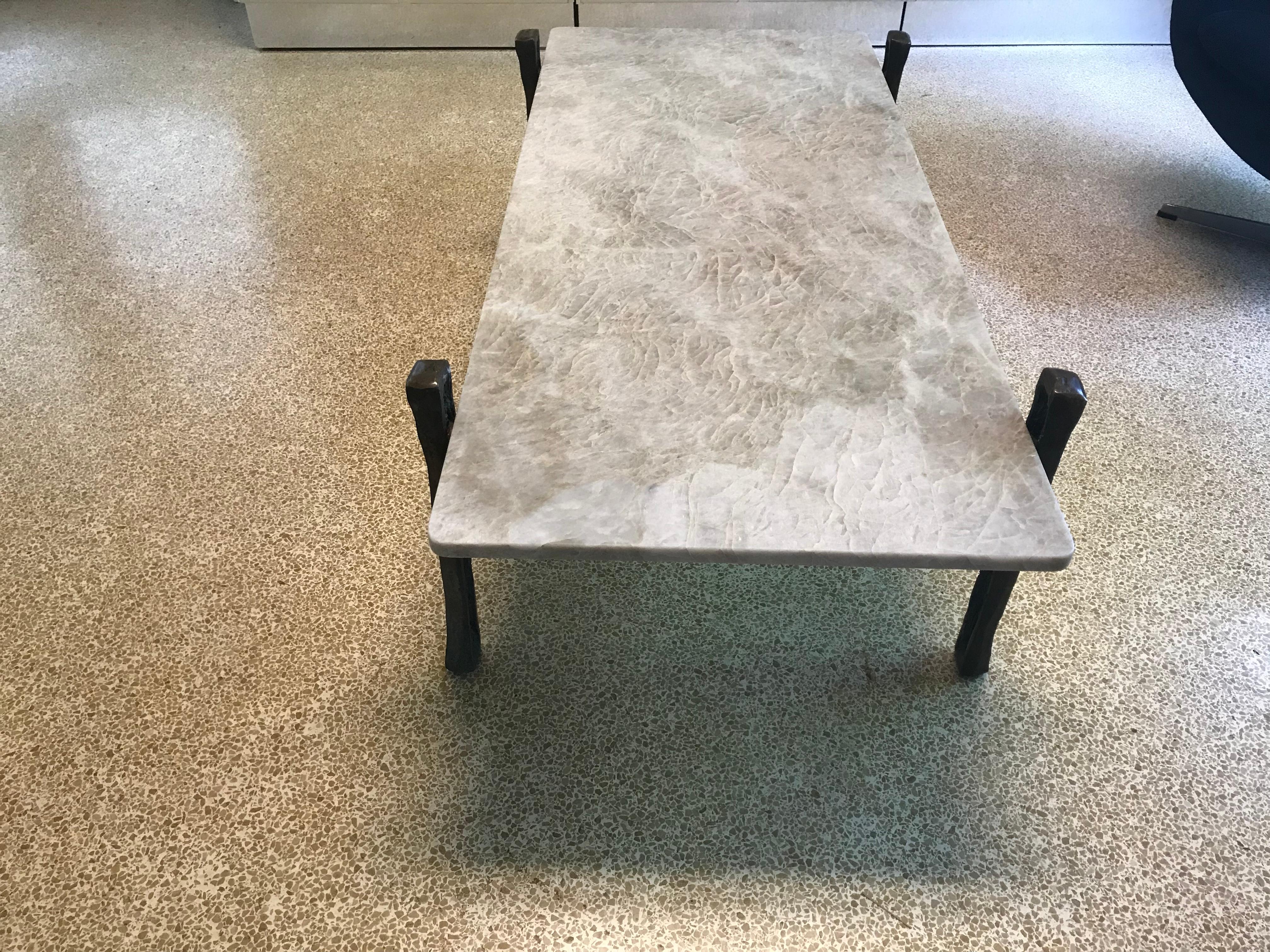 This amazing coffee table is very simplistic and stylish. I love the clean lines. The cristallo top adds a warm finish to an amazing base.