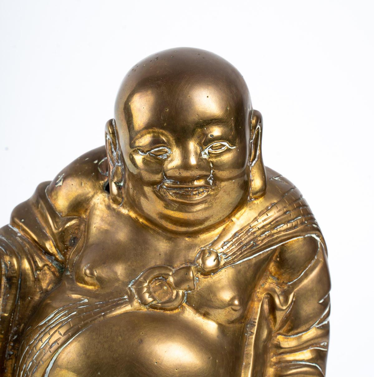 Bronze Buddha, 20th century.
Measures: H 26 cm, W 20 cm, D 10 cm.