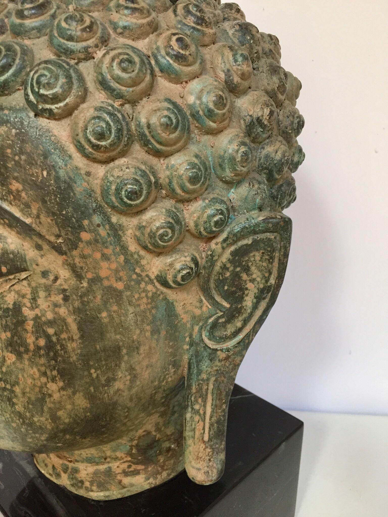 Cast Bronze Buddha Head on Marble Stand