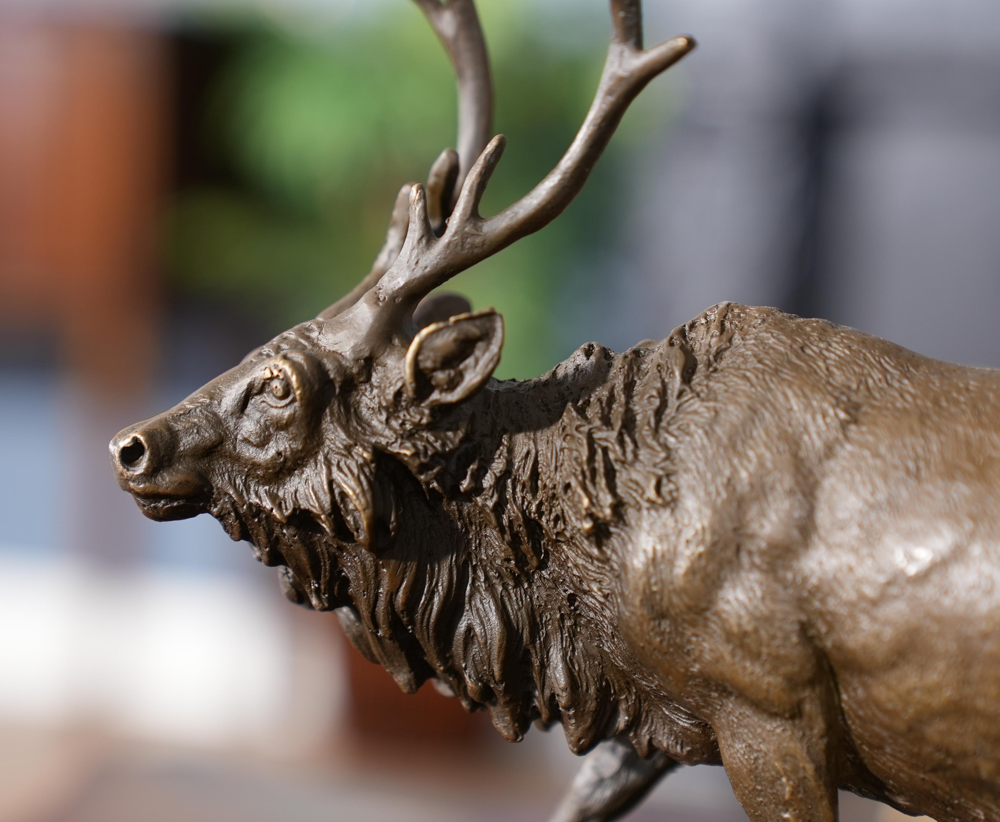 Graceful even when standing still the Bronze Bull Elk with Marble Base is a striking addition to any setting. Using traditional lost wax casting methods the Bull Elk statue is created in pieces and then joined together with brazing and hand chaised