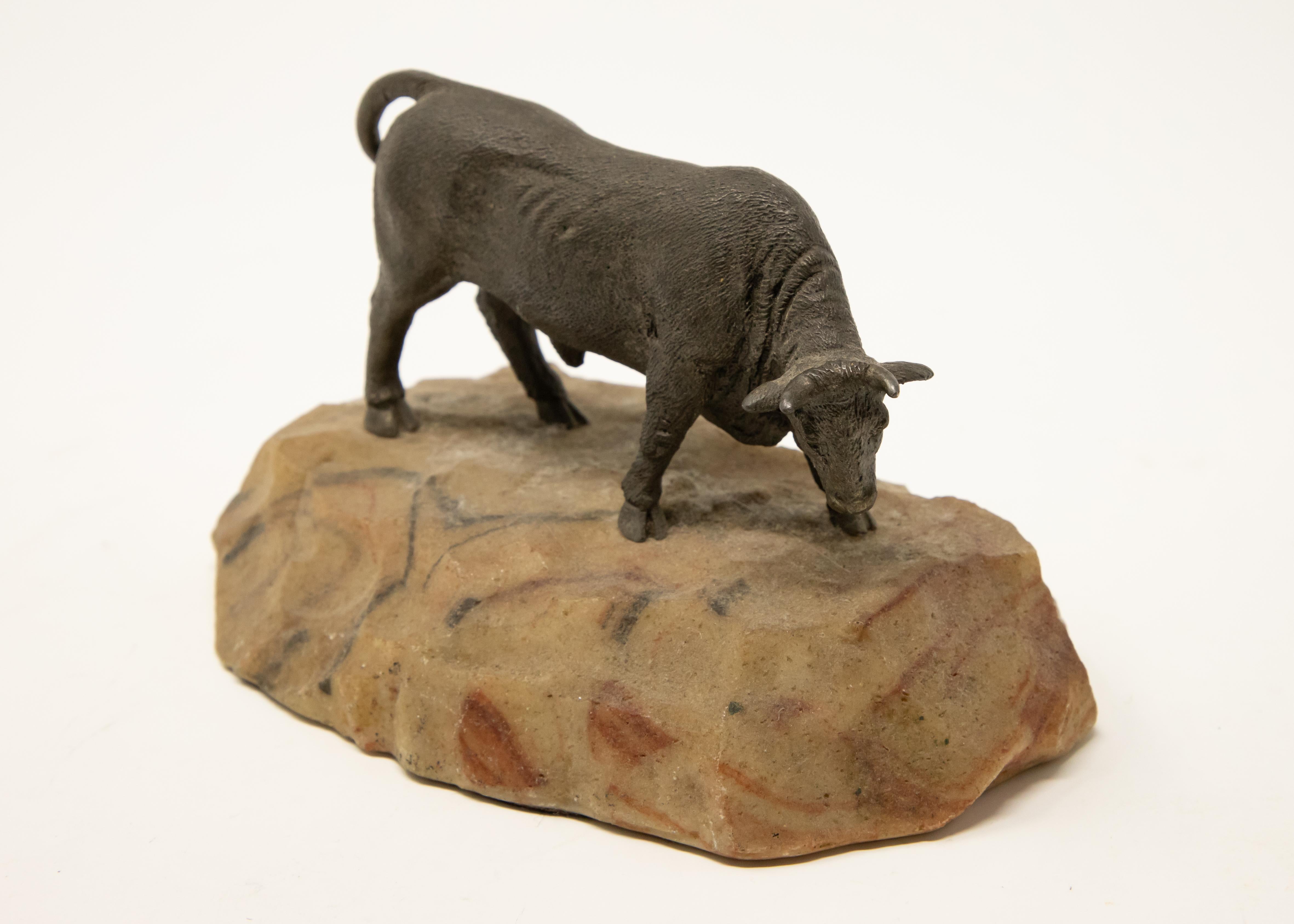 Folk Art Bronze Bull on Stone Base For Sale