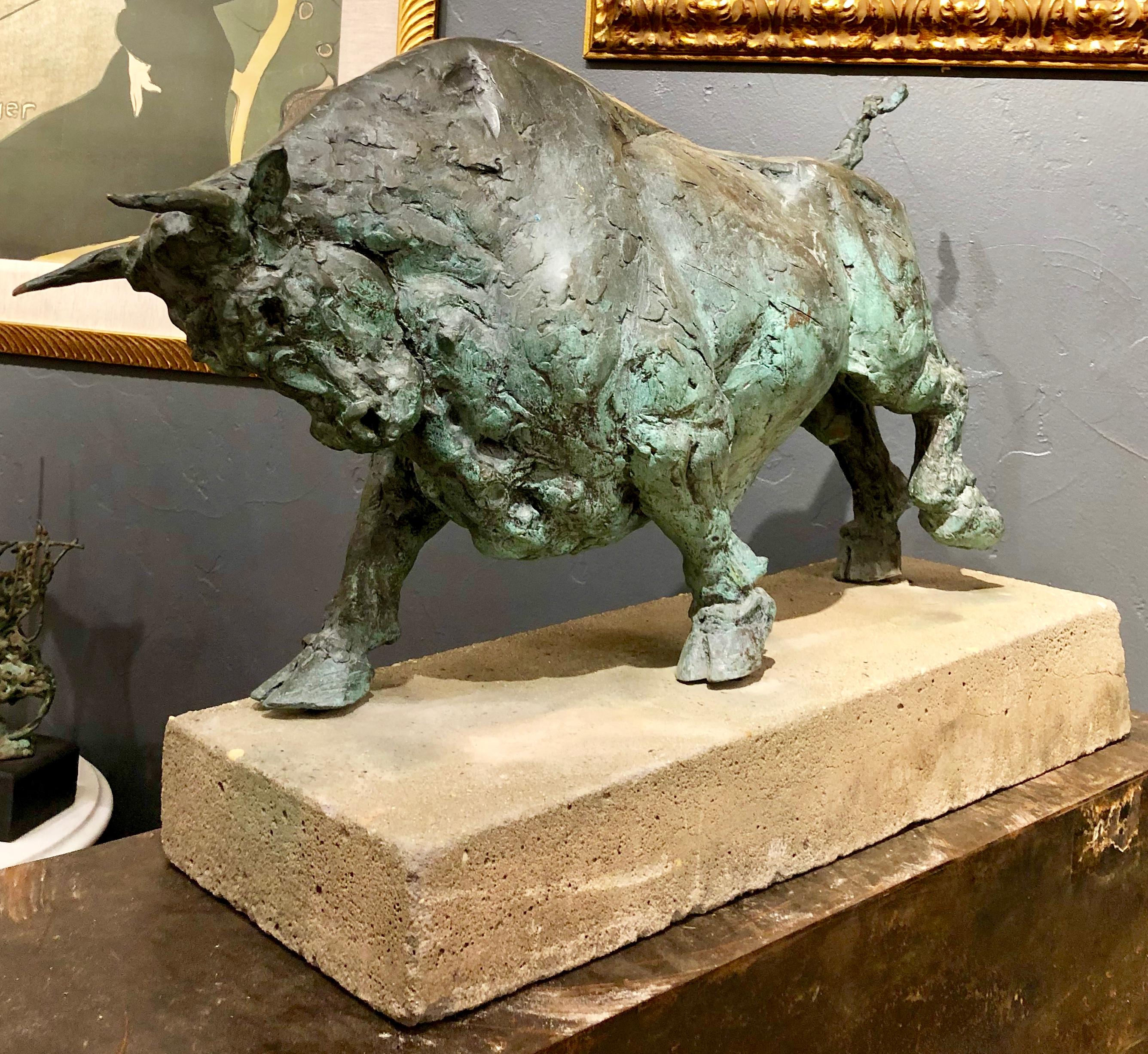 This bronze has an beautiful patina and looks to be an important work of art. No signature found, but it is substantial and very well executed. Most likely the original concrete base that has a slant to accentuate the charging of the bull. Age