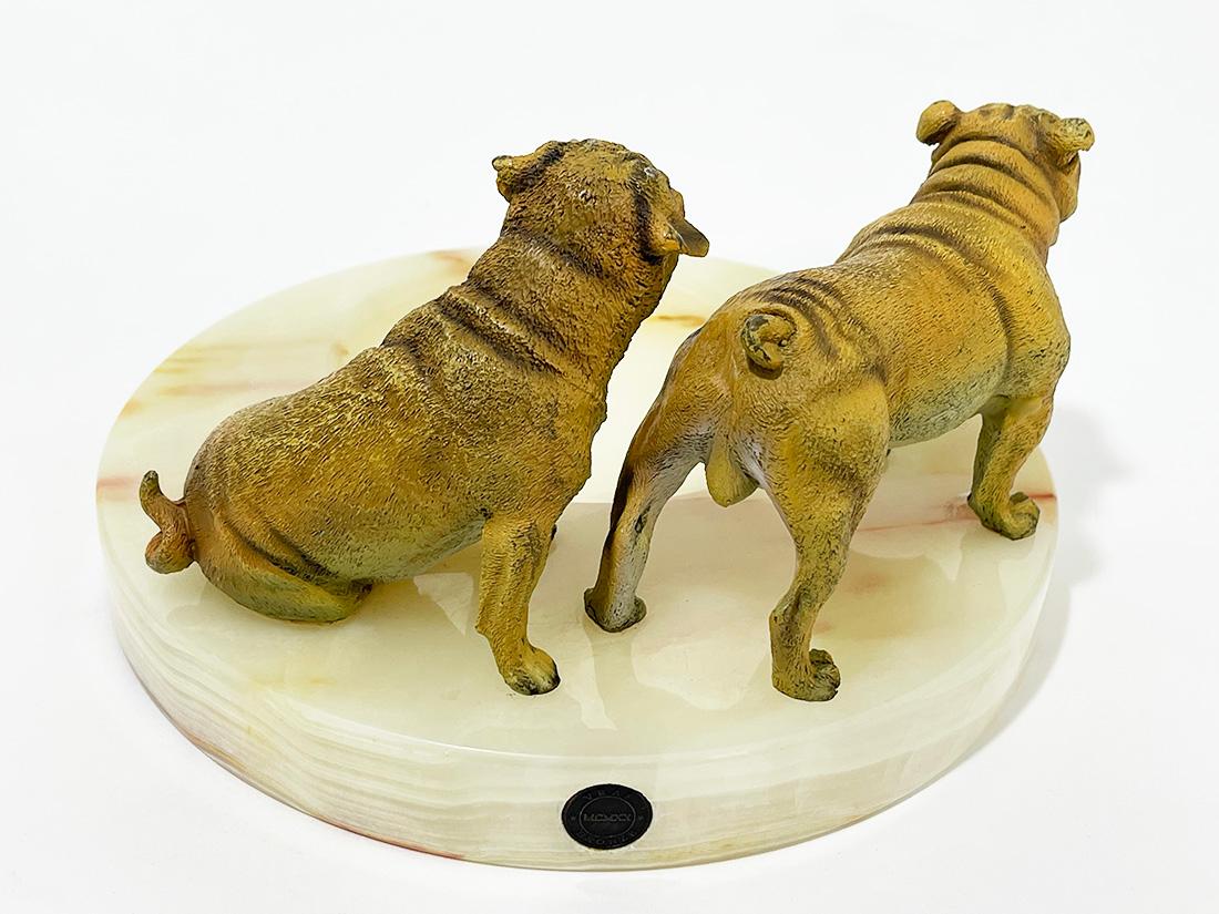 French Bronze Bulldogs on an Onyx base by Vrai, France, 1920 For Sale
