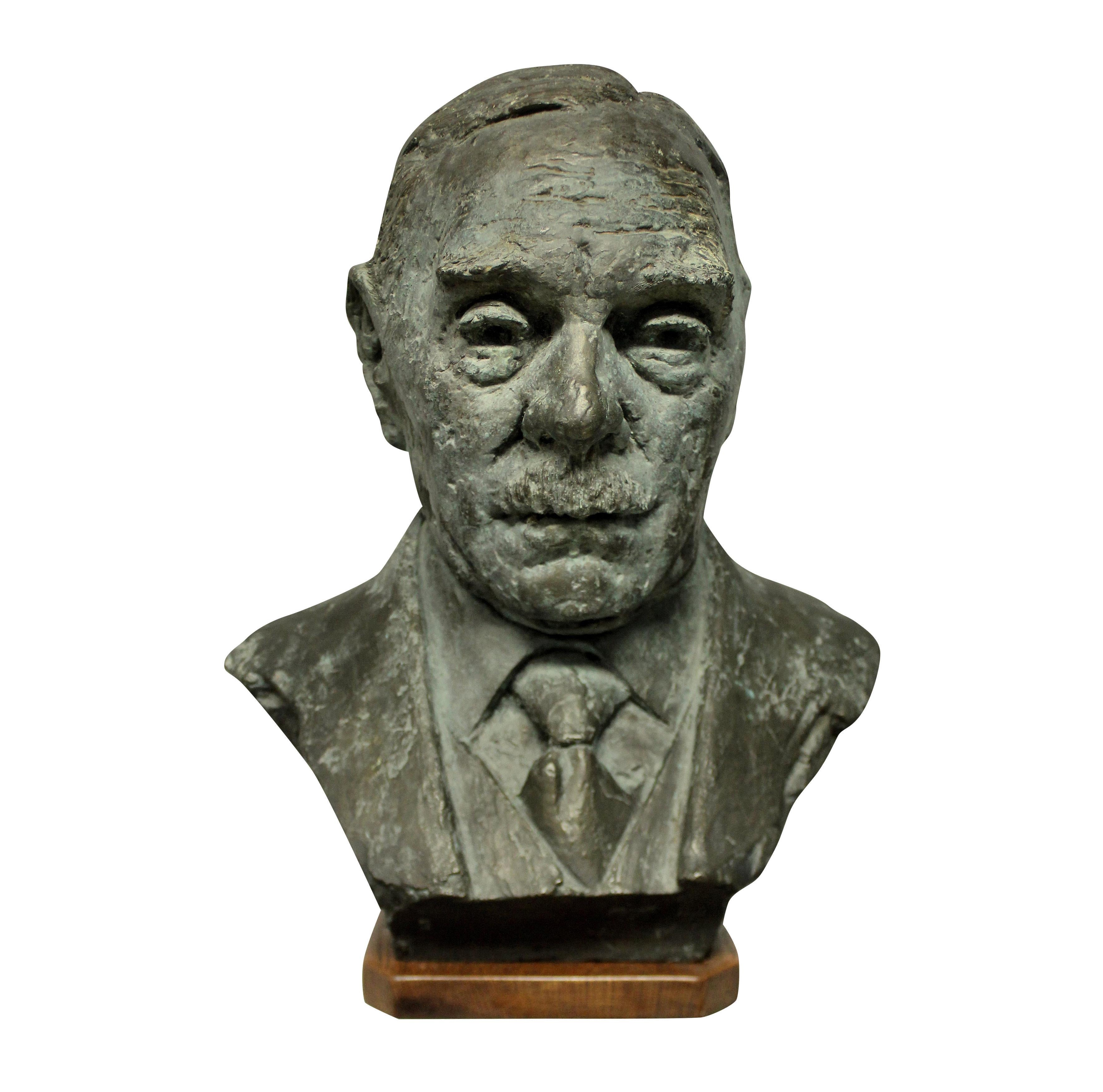 An English bronze bust of a gentleman in the manner of Jacob Epstein. Signed and dated DB 1960.
