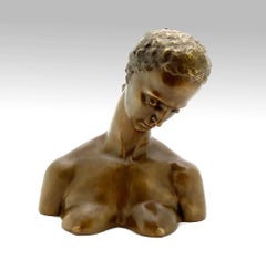 Busto di bronzo, testa inclinata di donna, XX secolo
