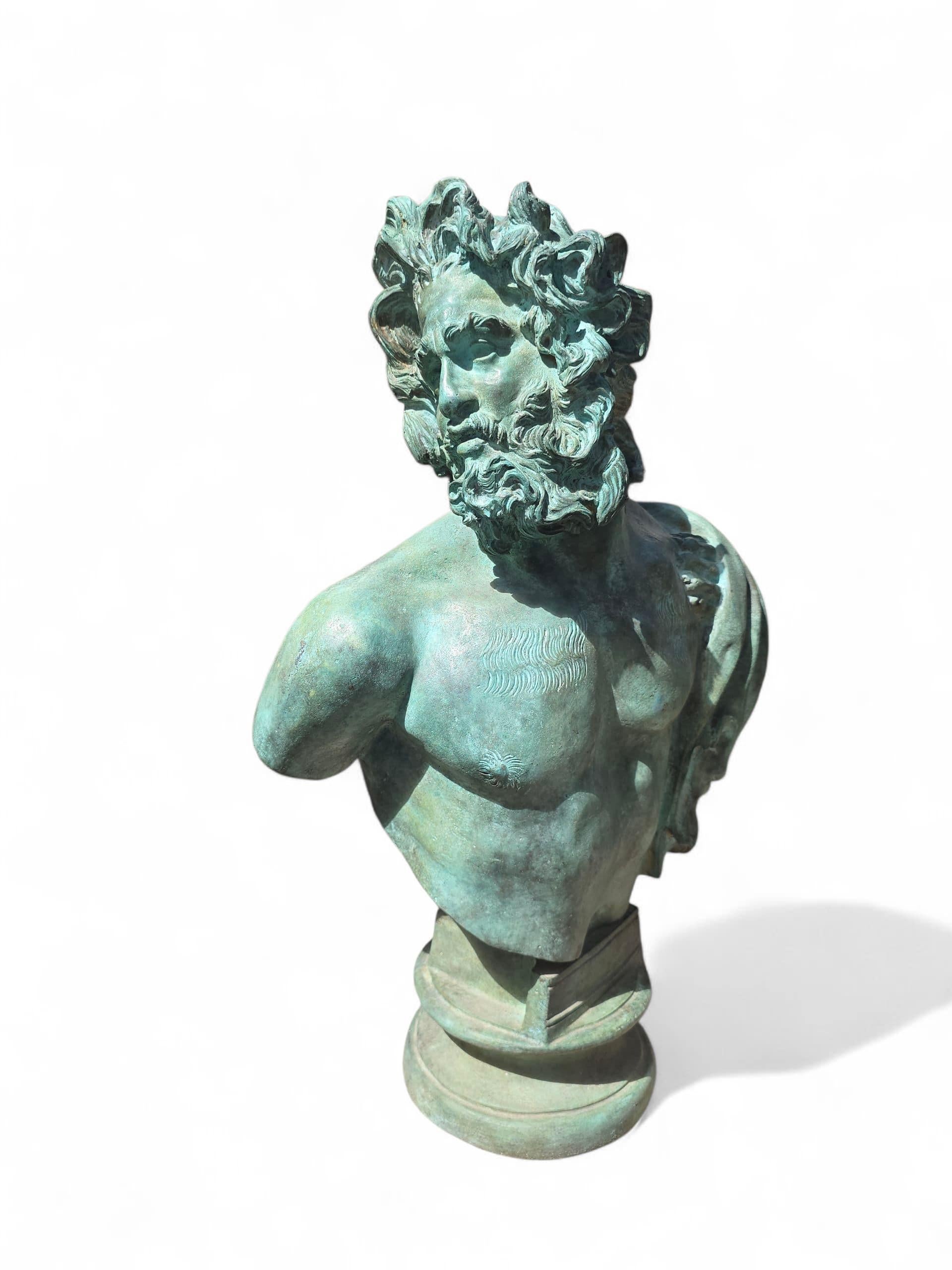 Elegant bronze bust of a faun, cast by the renowned Fonderia Chiurazzi of Naples in the 20th century. This finely executed sculpture features the mythological figure with expressive features, curled horns, and a joyful demeanor, reflecting the