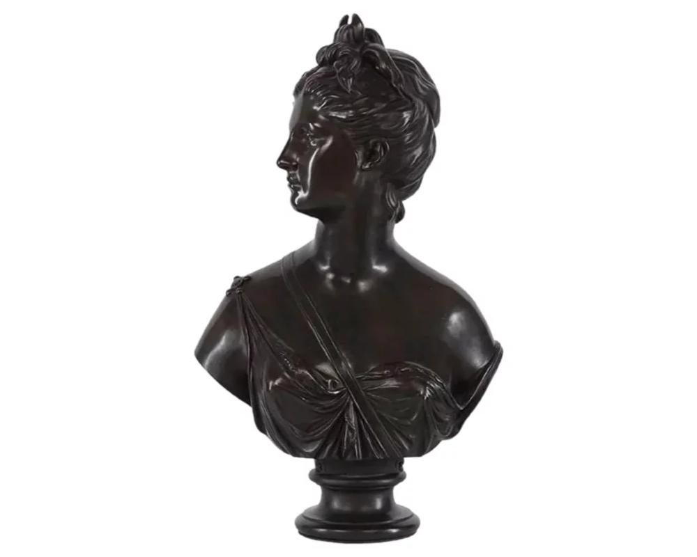 After Jean Antoine Houdon (French, 1741-1828) Diana. 
Bronze bust with brown patina. 
Impressed 