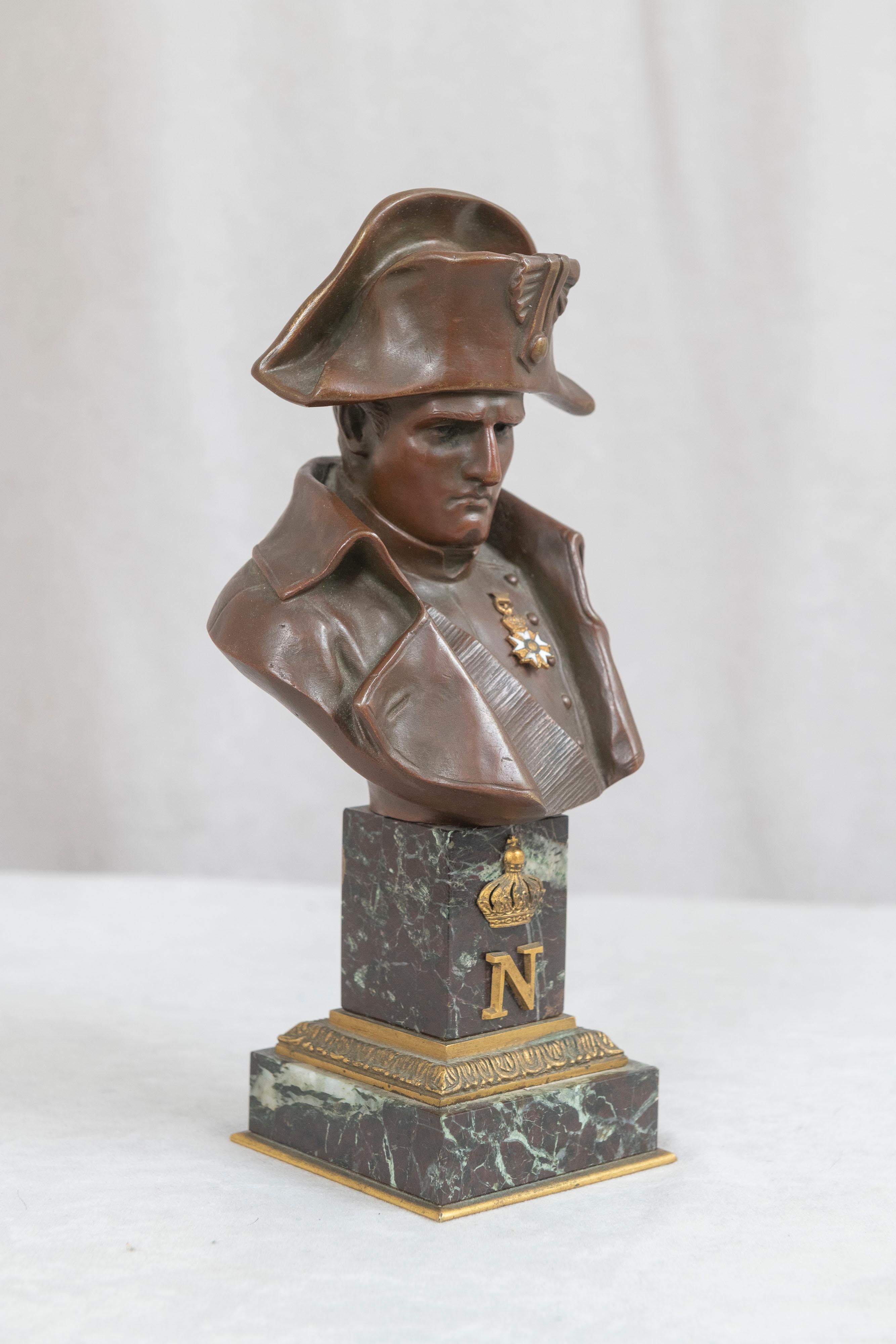 Beaux Arts Bronze Bust of Napoleon Wearing His Medal, Mounted on a Double Marble Base, 1910