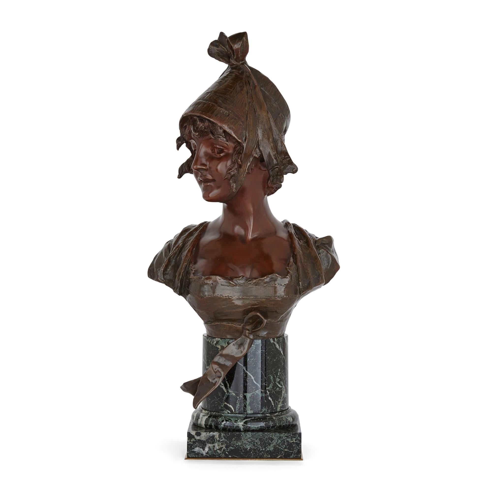 Bronze bust on marble plinth by Georges van der Straeten
Belgian, c. 1900
Measures: Height 69cm, width 34cm, depth 21cm

This beautiful portrait bust is by the Belgian sculptor Georges van der Straeten. The bust depicts in patinated bronze a