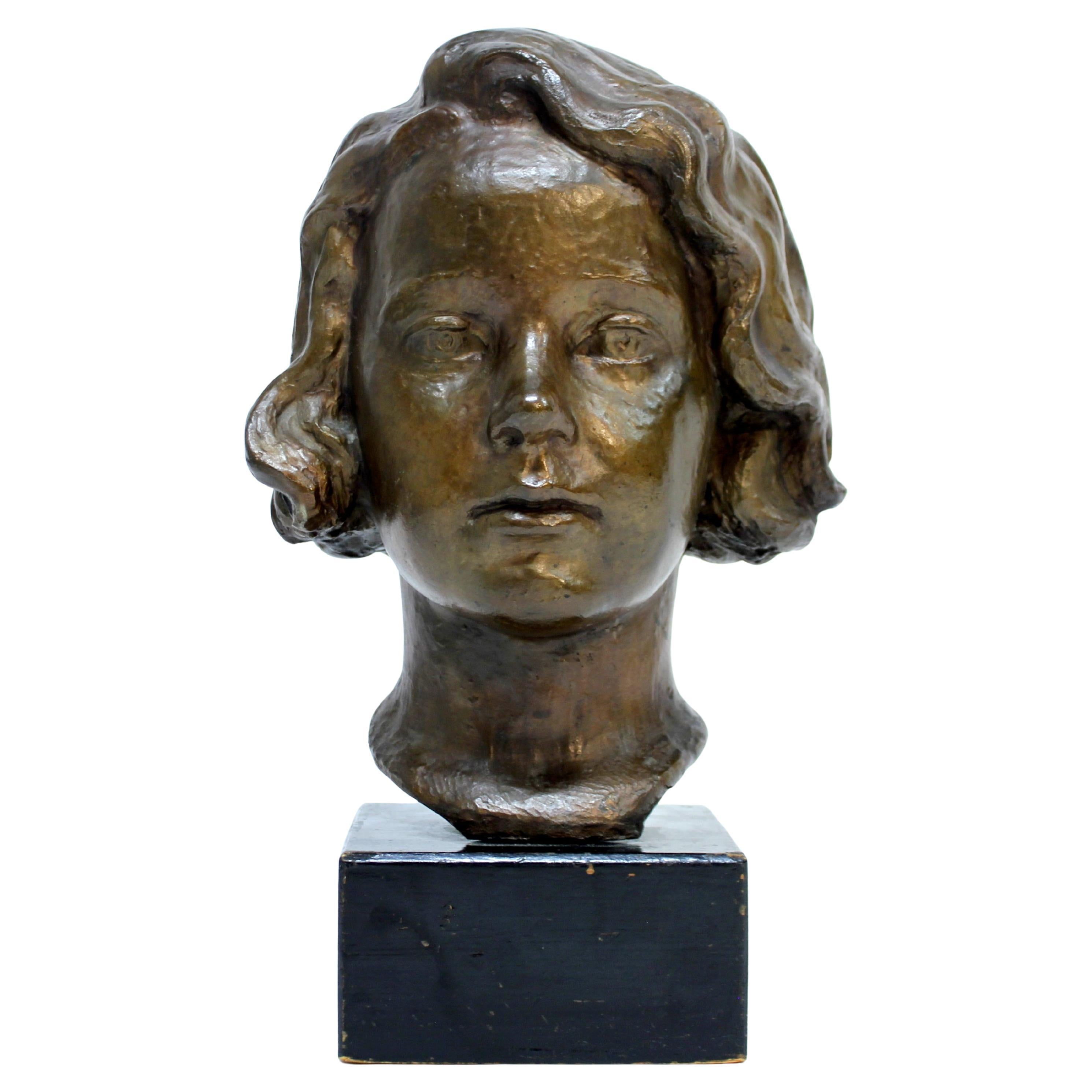 Bronze bust / sculpture depicting a girl, signed J.G, Swedish, ca 1940s For Sale