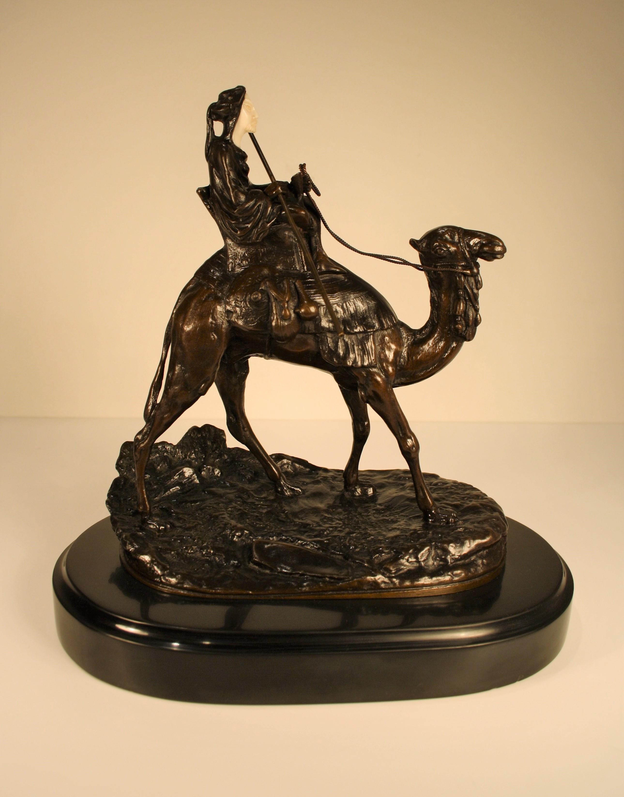 A bronze sculpture on a black marble base by the French sculptor Agathon Leonard (1841-1923) depicts a beduin on camelback.
Signed A. Léonard on the base.   
  