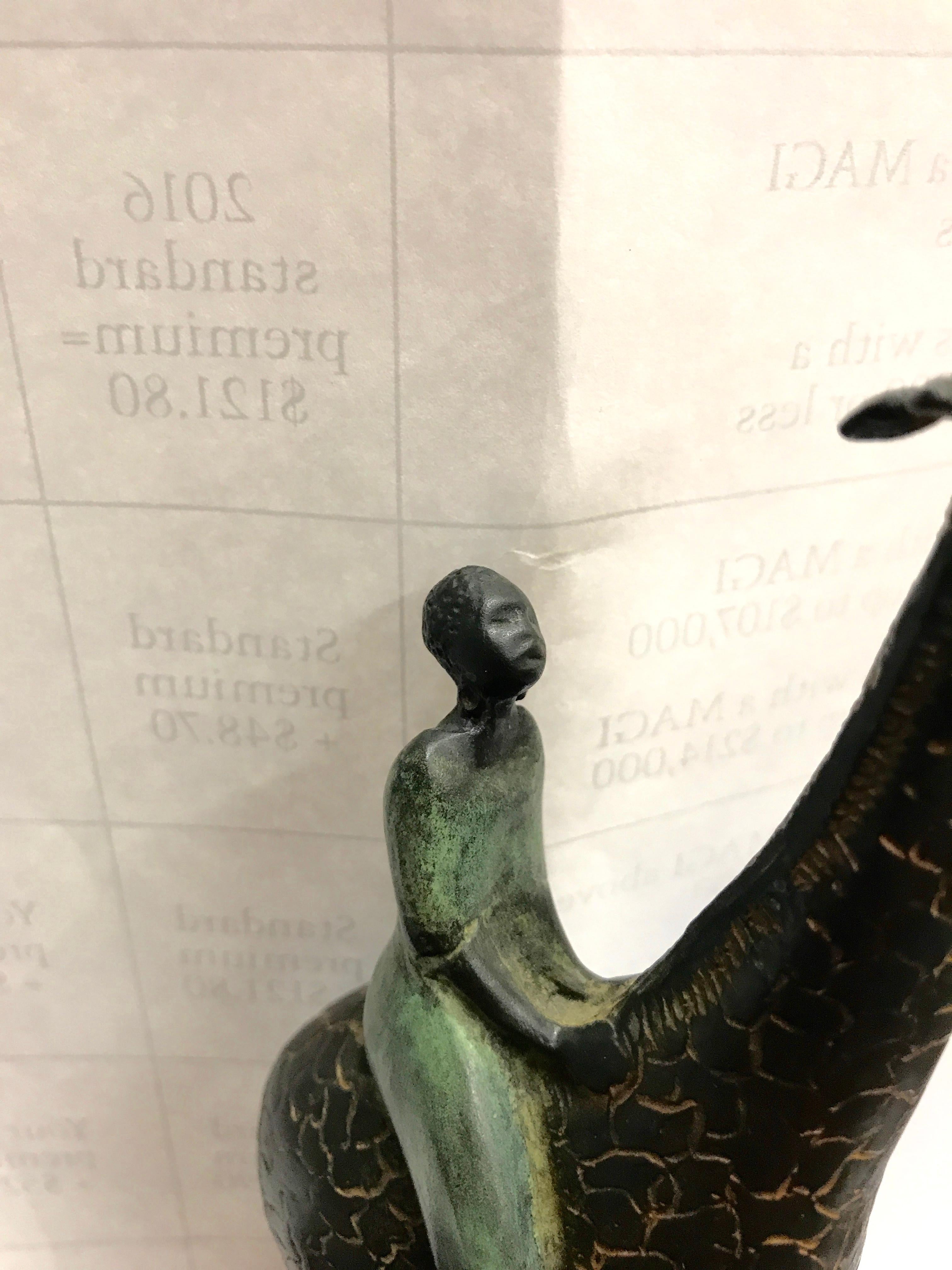 Bronzo dell'artista del Colorado Craig Lehmann Giraffa con cavaliere africano in vendita 3