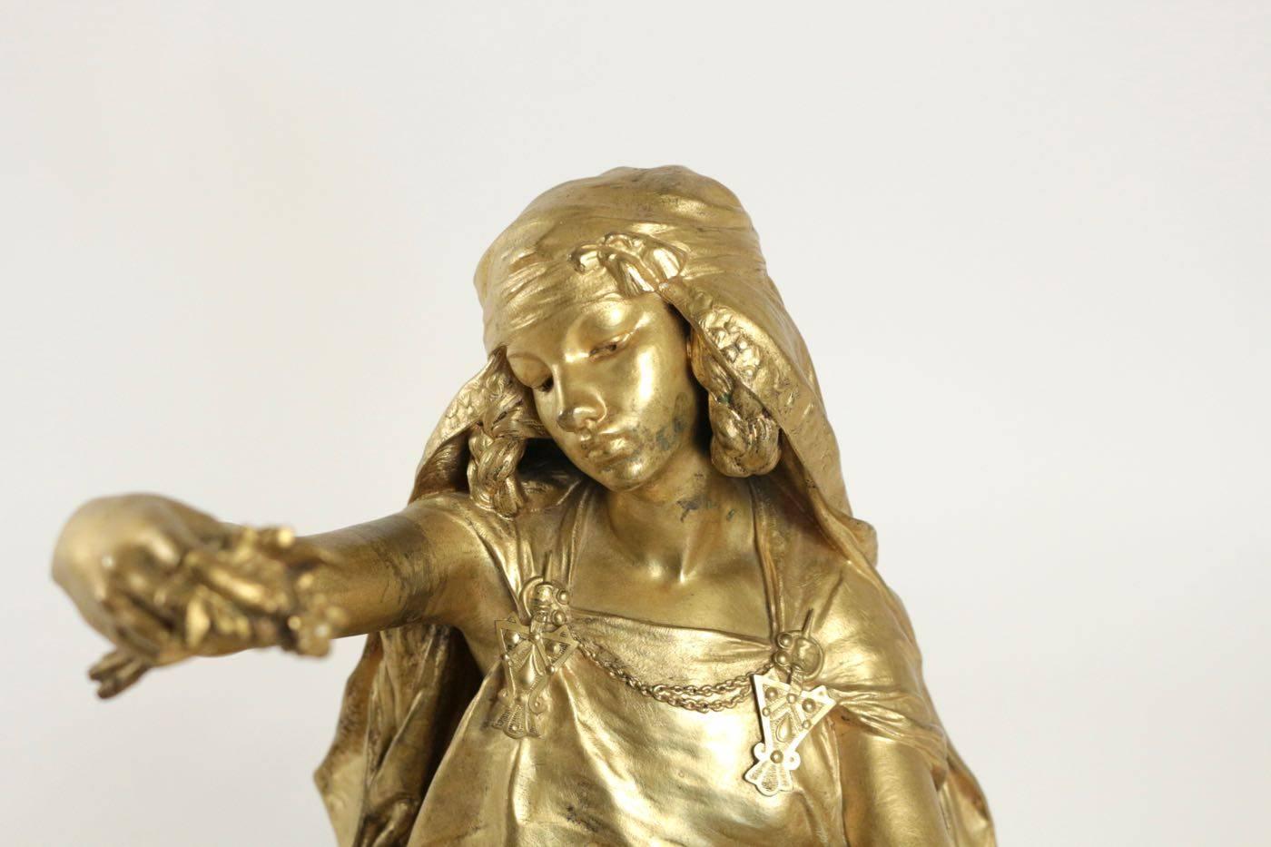 Bronze by Louis Ernest Barrias, “Little girl seated” in gold gilt bronze, original gilding. Swiss foundary Paris. Signed Bariasse, circa 1900.
Measure: H 31cm, L 31cm, P 27cm.
 
