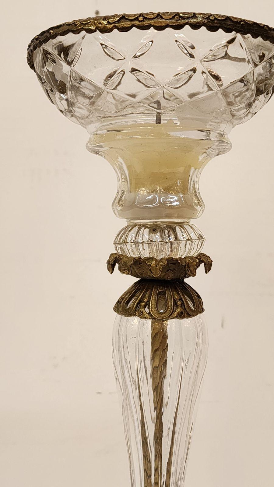 19th Century candlestick made of bronze and glass. 