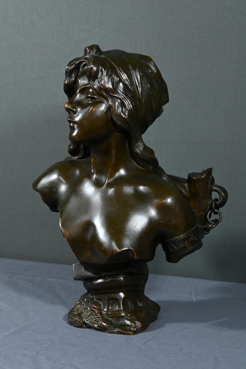 This bronze print with a brown patina, titled 