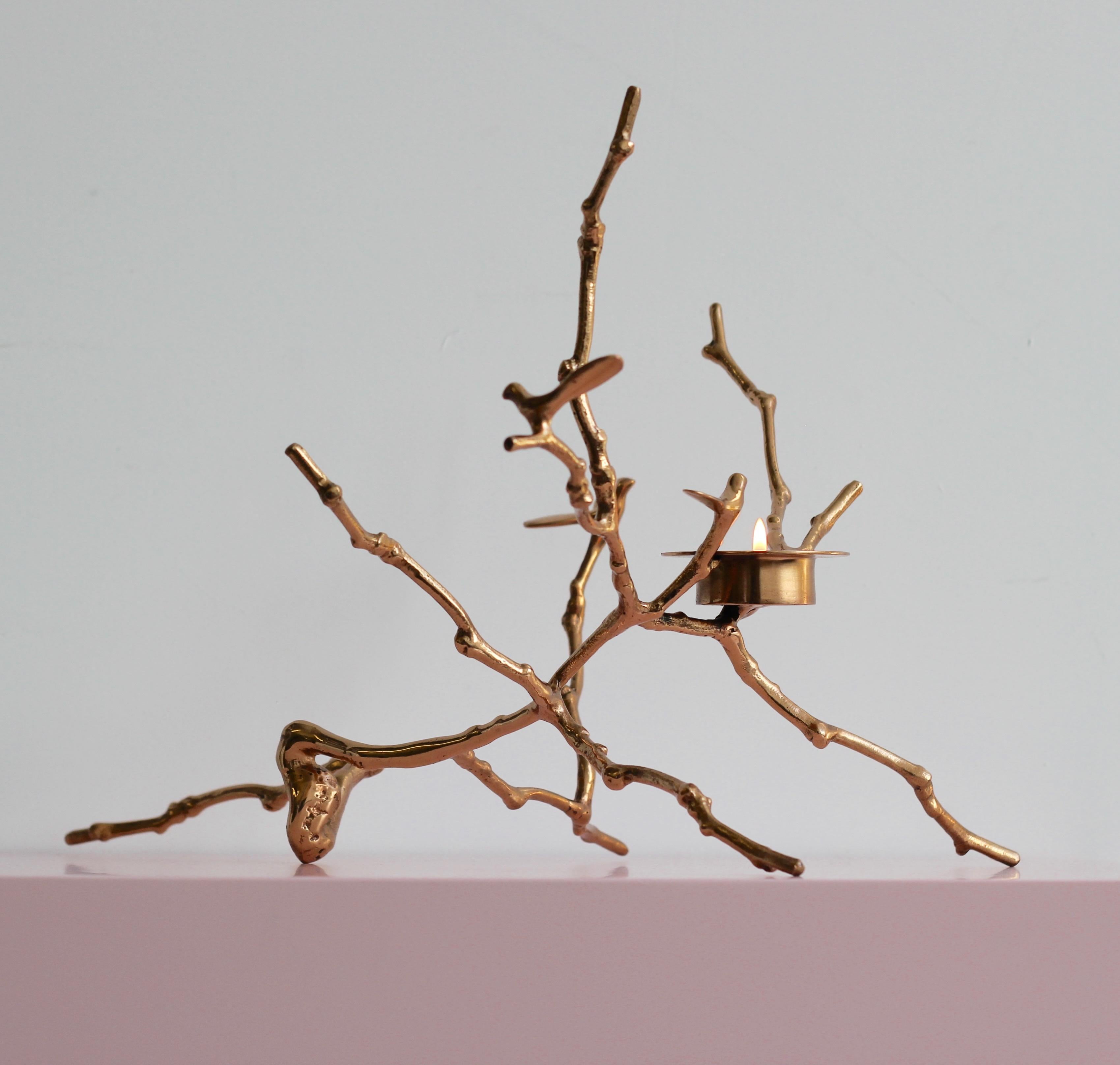 Original, unique and cast in bronze, creating sumptuous and unusual decorative elements for beautiful homes.

Each of these splendid bronze Magnolia twig T-light holders is handmade individually with incredible detail. Cast using very traditional