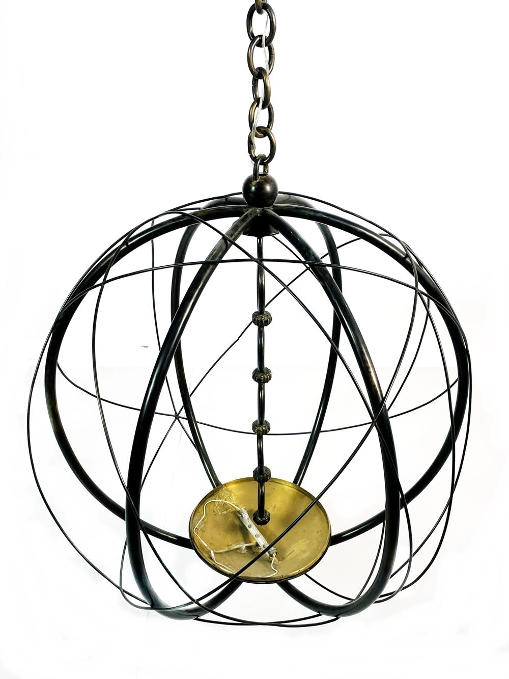Introducing the exquisite Bronze Chandelier Made in France by Christine Rouviere for Cinabre and it came out from Sylvester Stallone Home in Beverly Park.
 This beautiful chandelier is handcrafted by skilled artisans in France and designed by