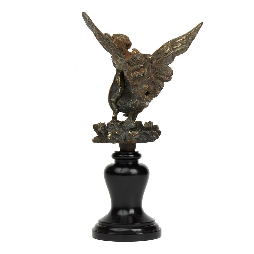 Anglais Sculpture en bronze d'un chérubin et d'une tête de fontaine vulnératrice, 18ème siècle en vente