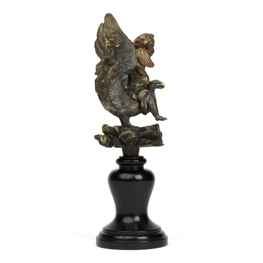 XVIIIe siècle Sculpture en bronze d'un chérubin et d'une tête de fontaine vulnératrice, 18ème siècle en vente