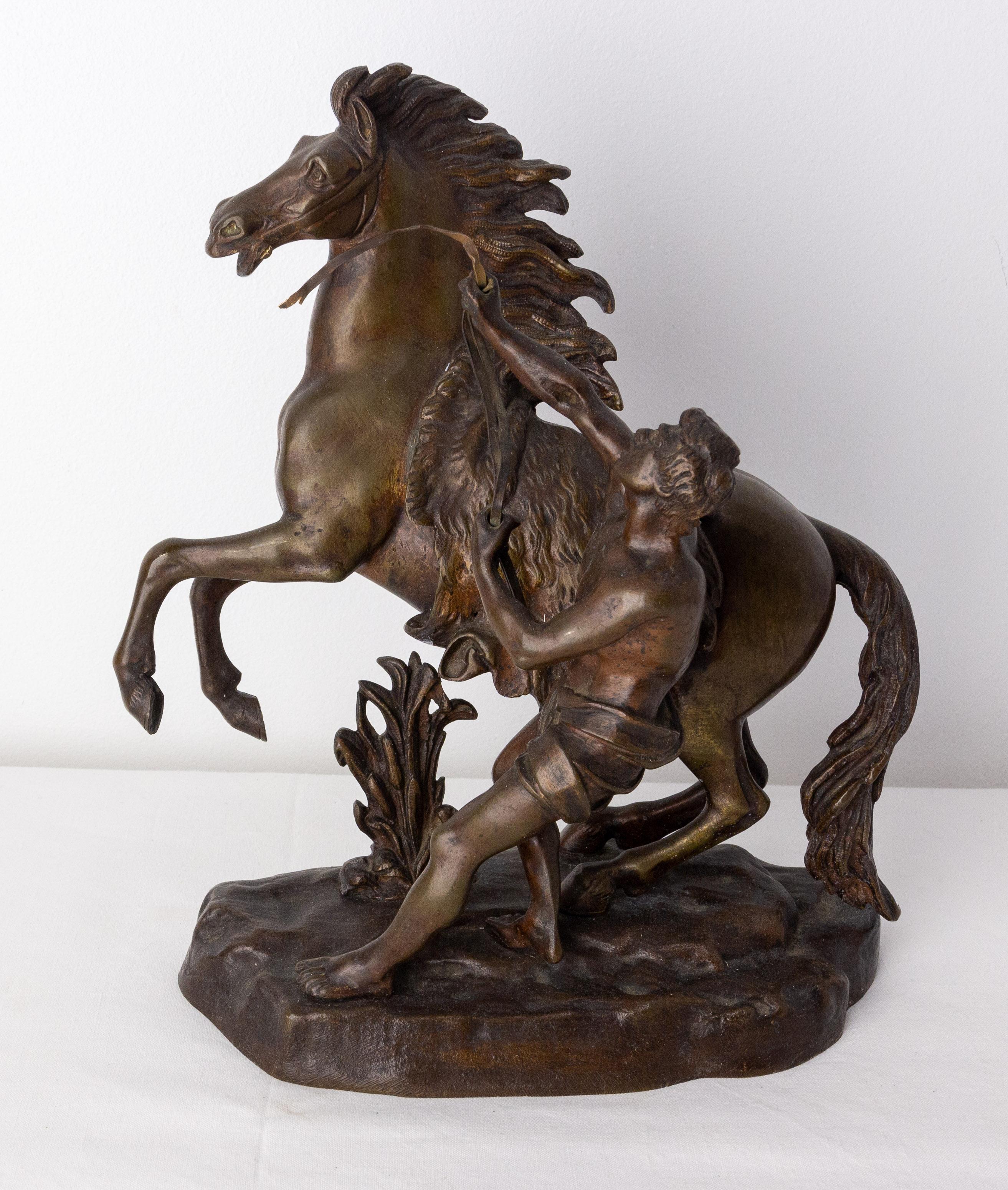 Bronze statue in the style of Guillaume Marly.
The horses of Marly were commissioned by Louis XV to sculptor Guillaume Coustou to decorate the entrance of the park of Marly castle. In 1794, the marble statues of Carrara were transferred to Place de