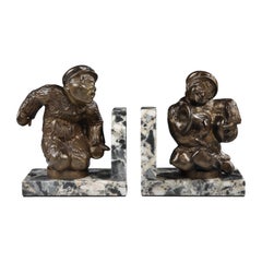 Antique Bronze 'Child Motorist' mascot bookends by Jean Verschneider, 1910