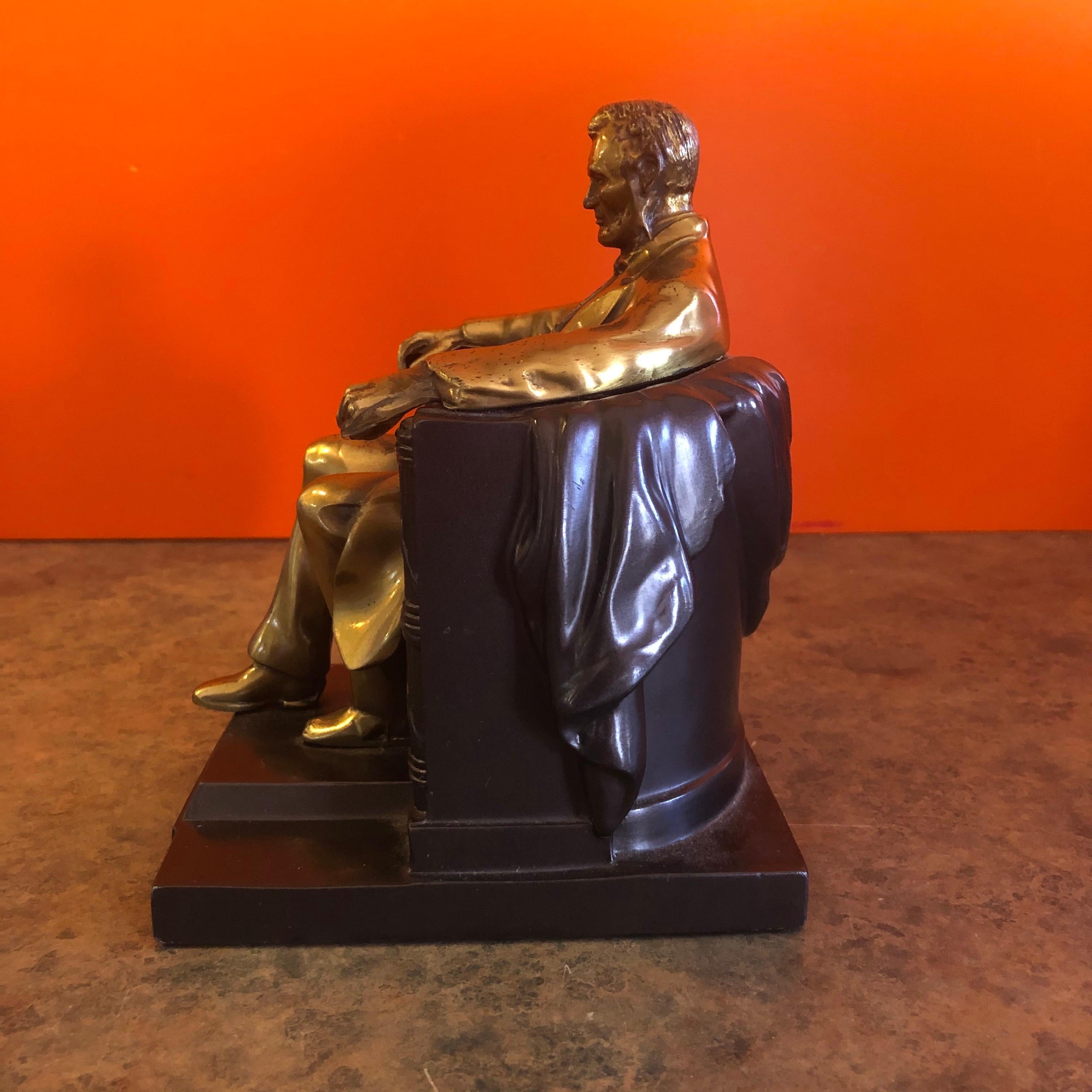 abe lincoln sitting in chair