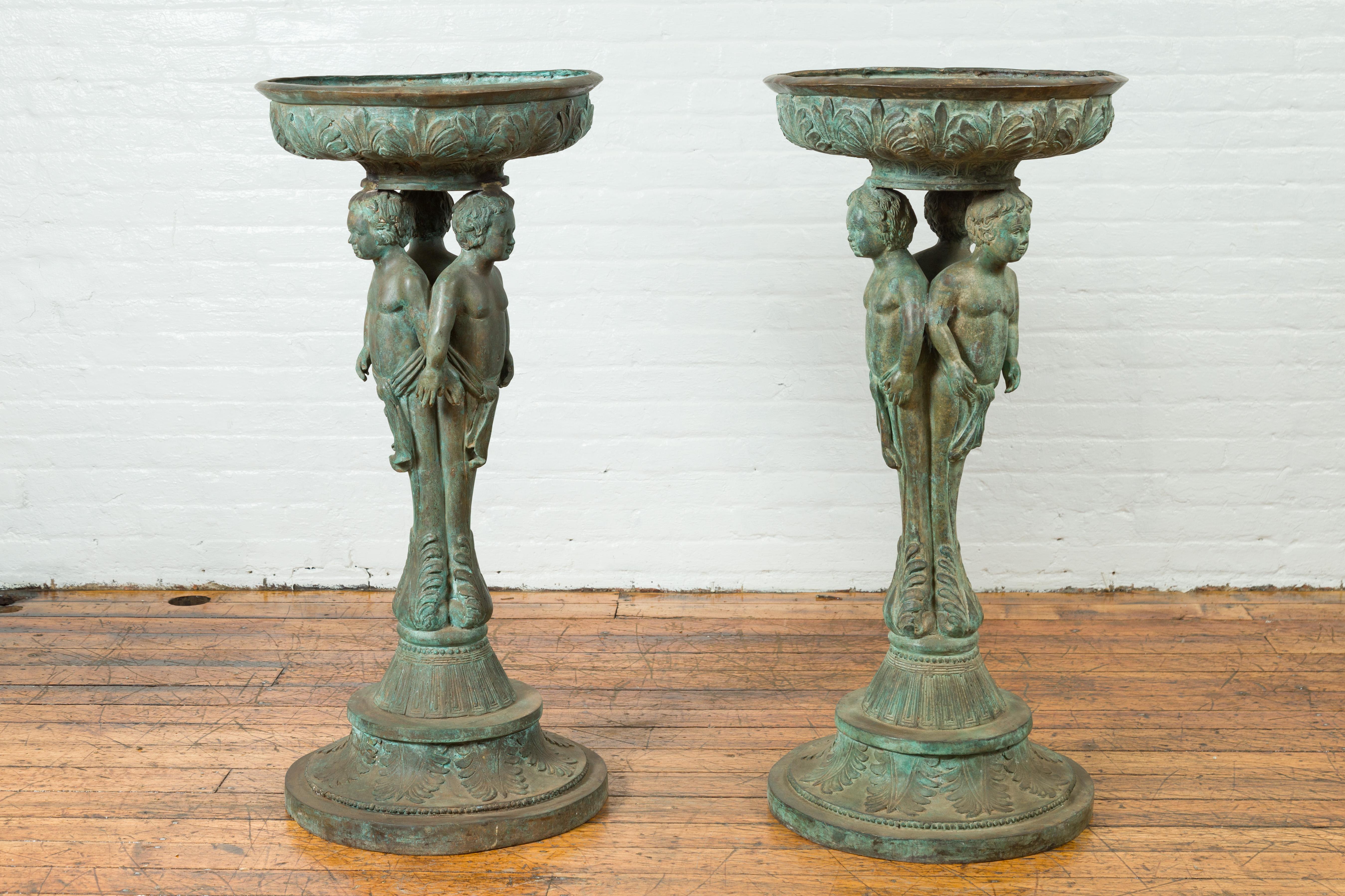 Cast Bronze Pair of Triple Cherub Planter Urns For Sale