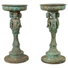 Bronze Pair of Triple Cherub Planter Urns