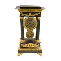 French Restauration Period  Patinated and Gilt Bronze Clock