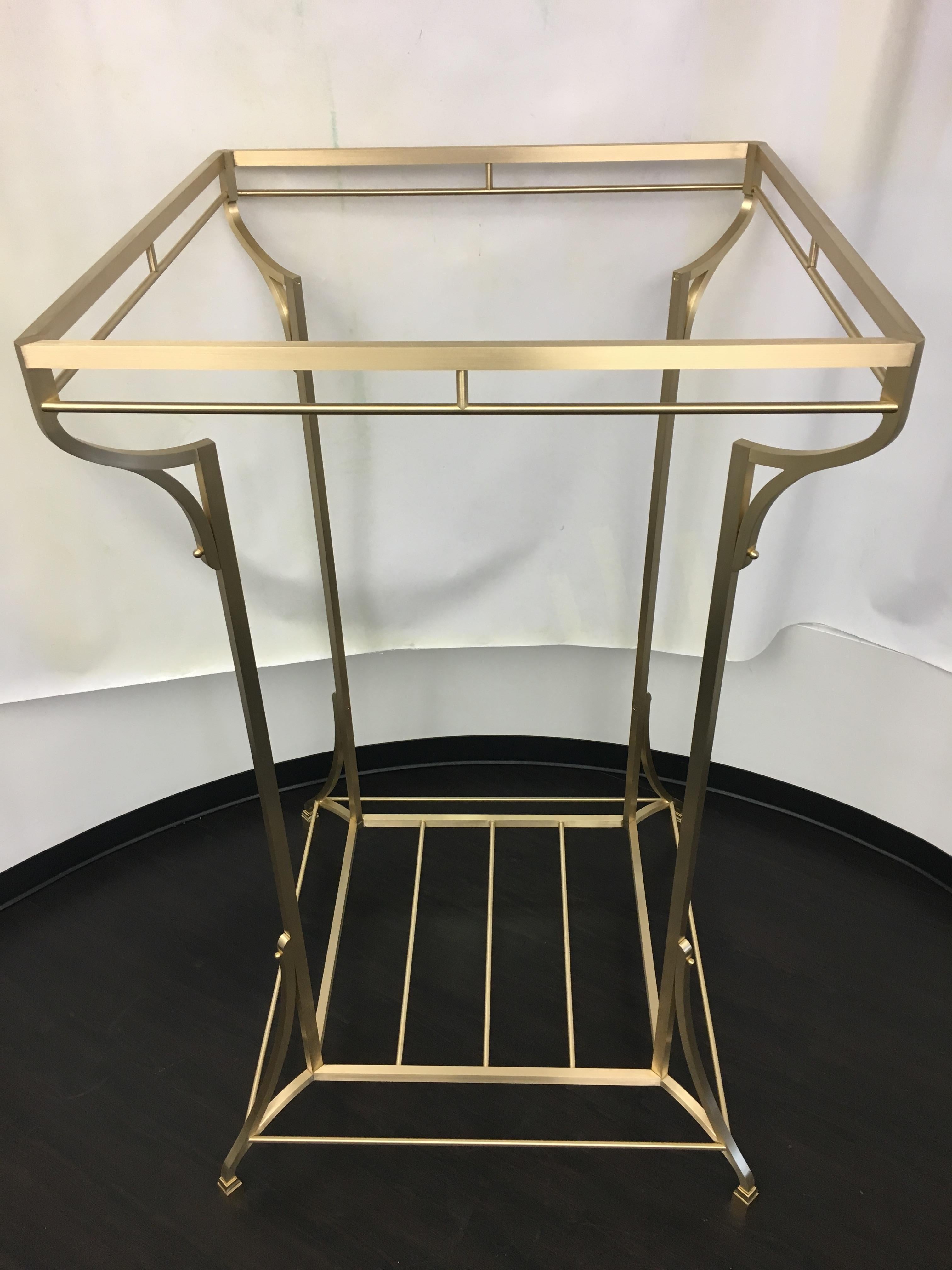 Beautifully handcrafted in our creative shop from solid architectural bronze. This piece can add organization to a closet or function as a coat rack. The lower shelve can also accommodate shoes. Aesthetically proportional curvature adds elegance to