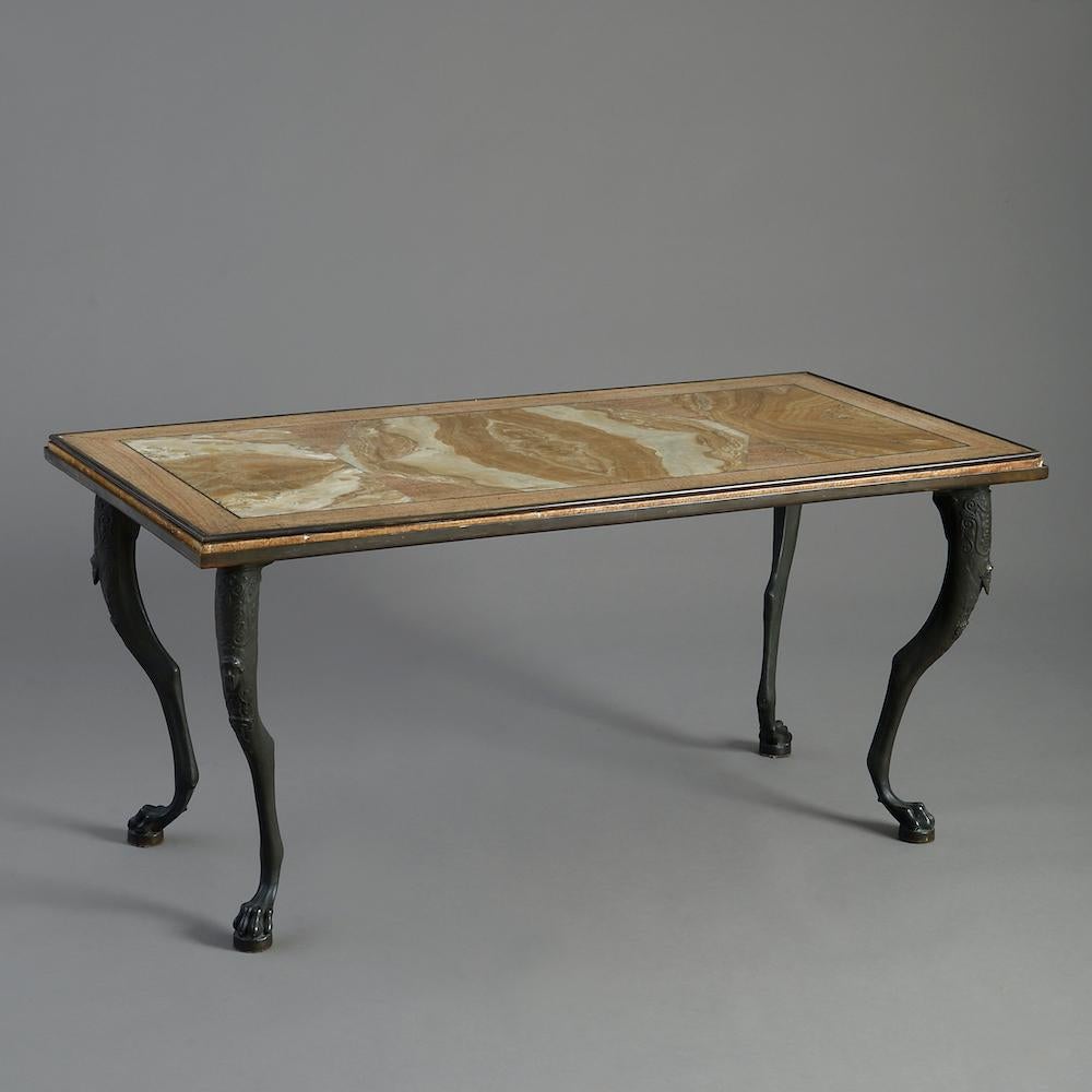 An Italian bronze low table with alabaster and travertine top, circa 1950.