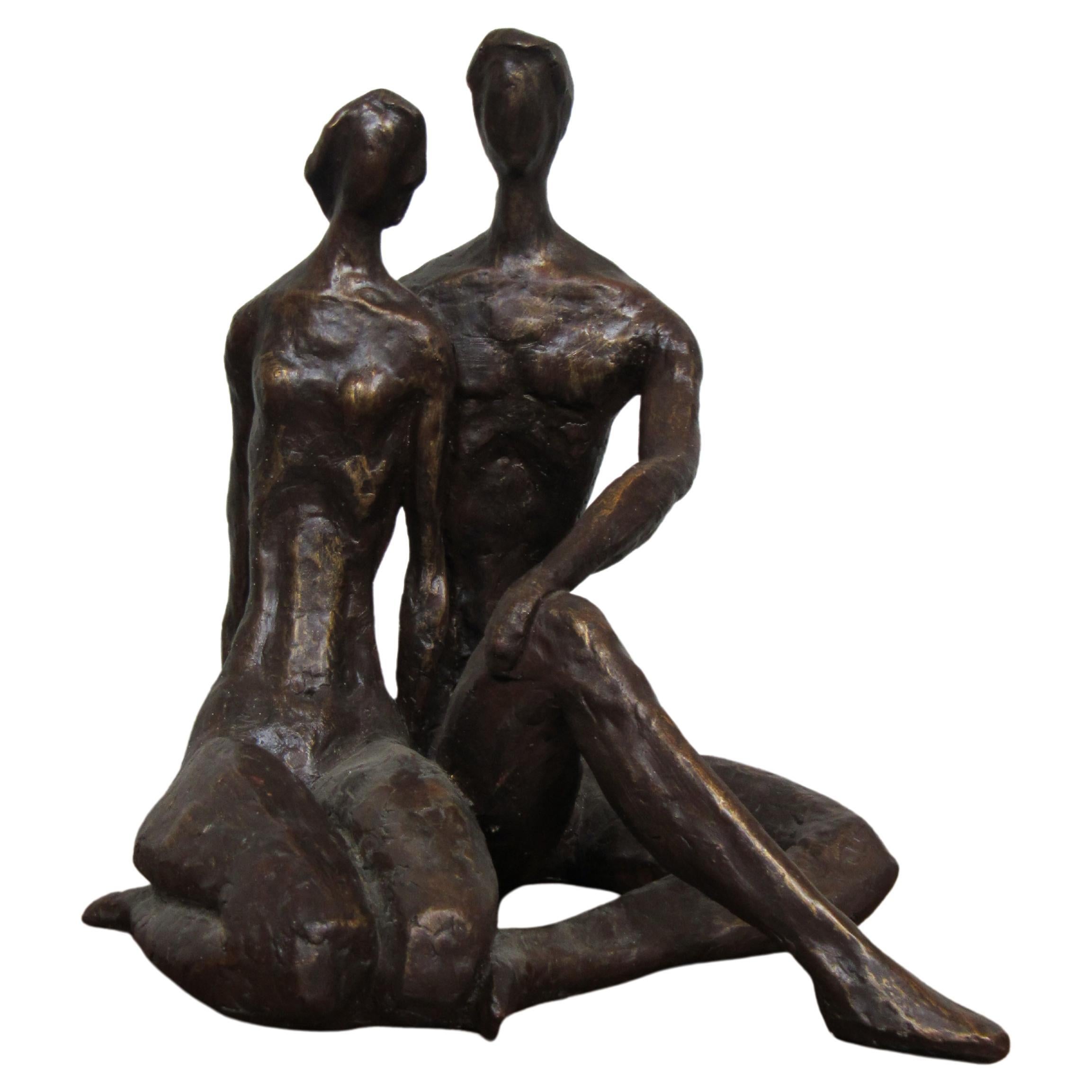 Bronze Colored Sculpture of Seated Couple