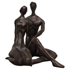 Bronze Colored Sculpture of Seated Couple