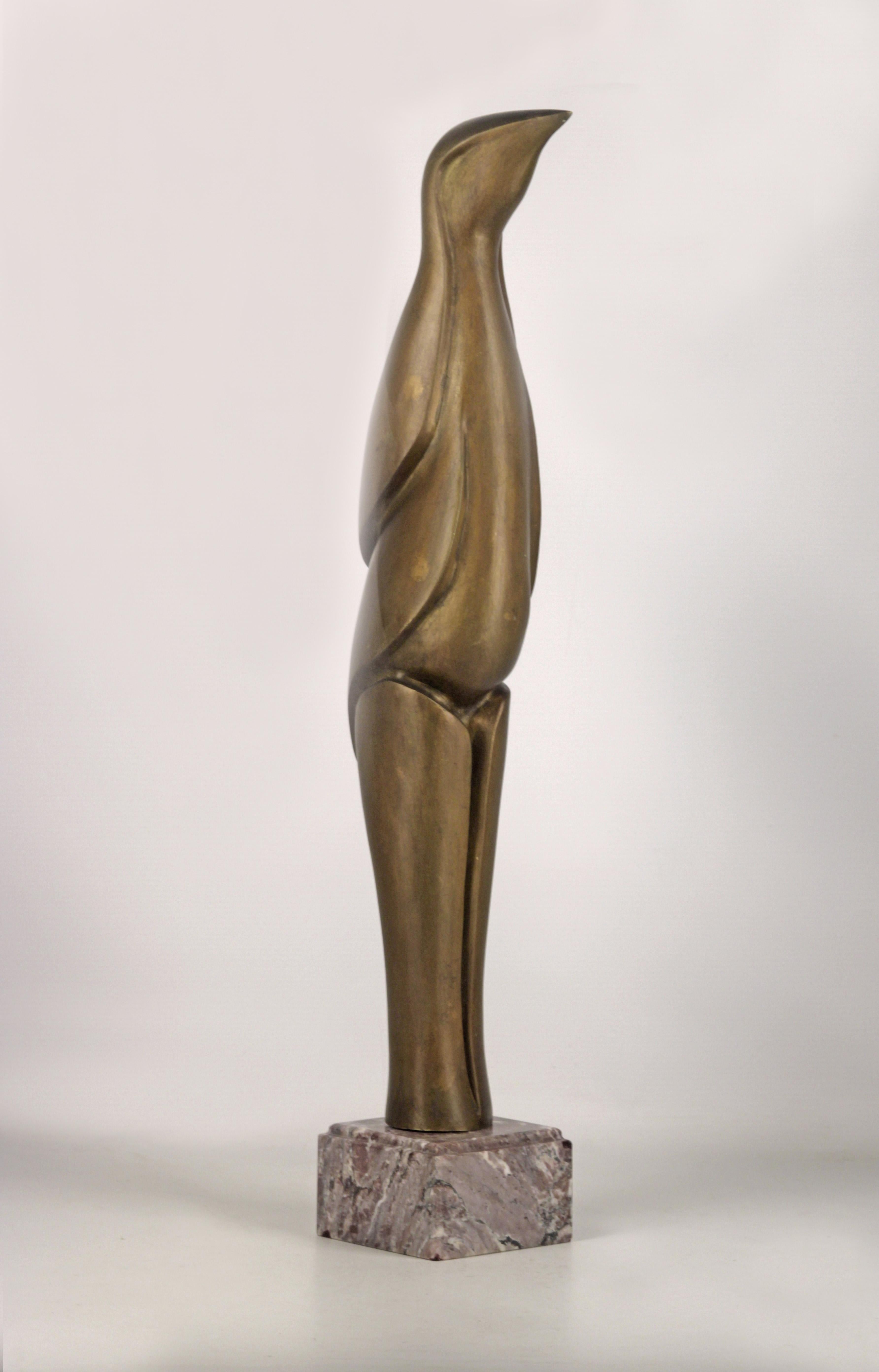 Bronze cubist sculpture
Penguin Motif
Art deco style Circa 1940 Origin France
No signature. Attributed to J.Martel
Piece rat. Has some wear
It has a small dent on its beak.
  marble base
Cubism is an early-20th-century avant-garde art movement that