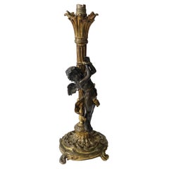 Bronze Cupido Cherub Lamp in the style of Denise Delavigne or Auguste Moreau.