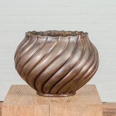Bronze Cylindrical Urn with Wave Motifs and Scalloped Opening, Pair Available