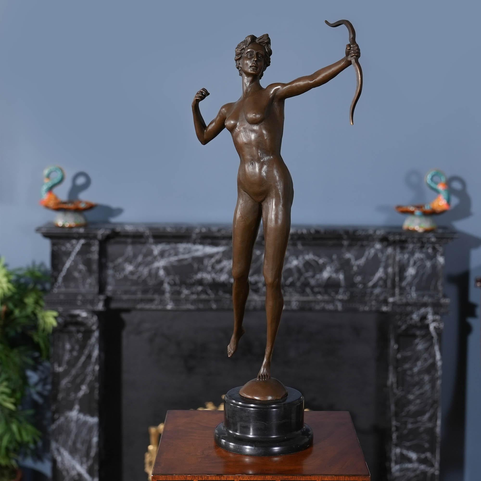 Graceful even when standing still the Bronze Diana the Huntress on Marble Base is a striking addition to any setting. Using traditional lost wax casting methods the Bronze Diana statue has hand chaised details added to give a high level of detail to