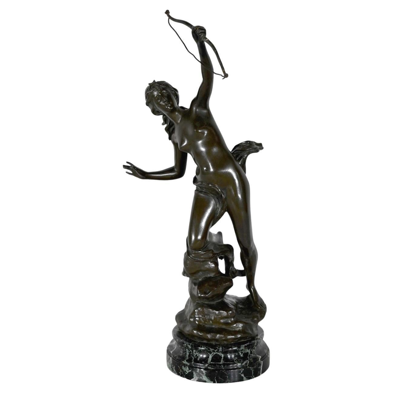 Escultura de bronce  "Diana Cazadora", firmado J. Garnier - 19.º