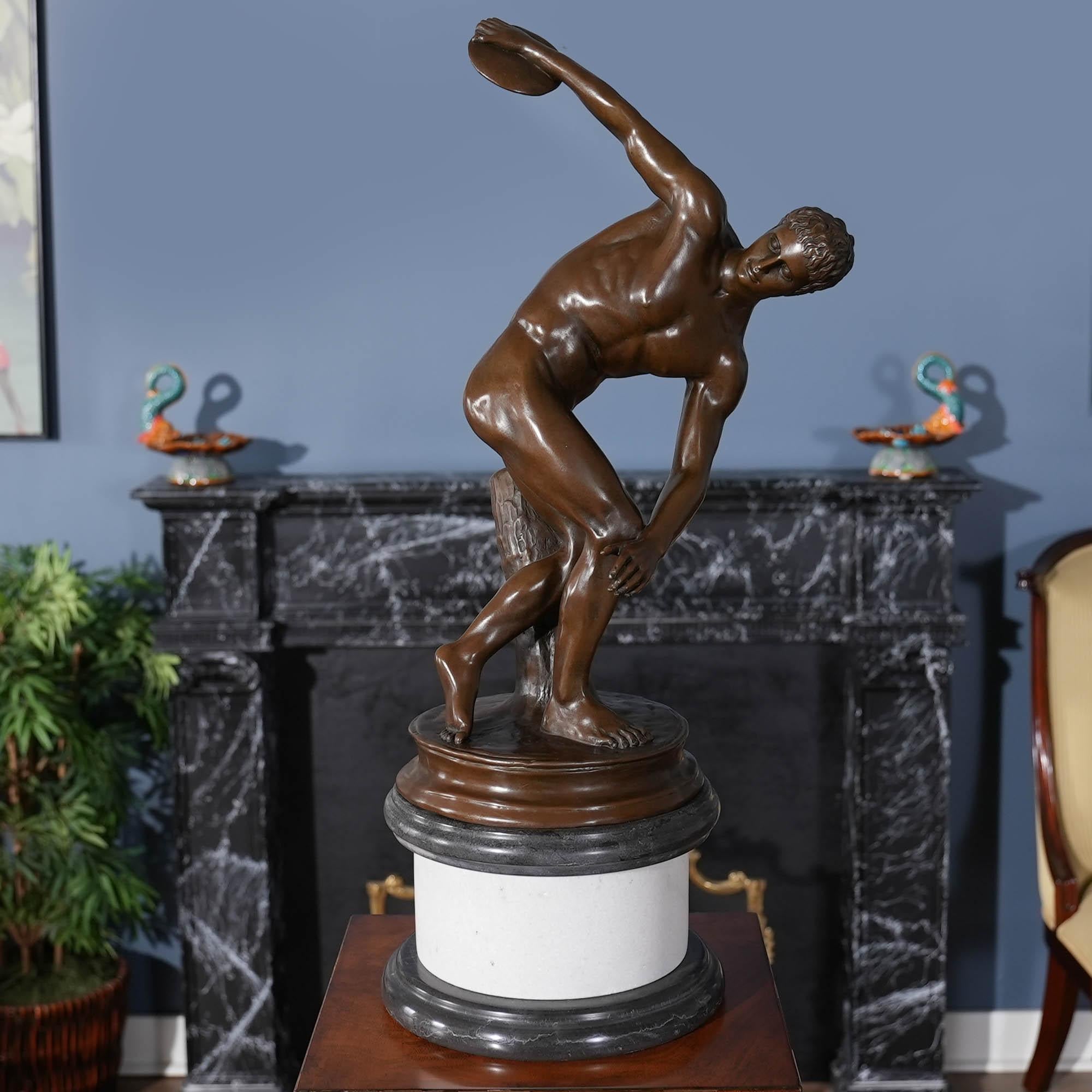 Graceful even when standing still the Bronze Discus Thrower on Marble Base is a striking addition to any setting. Using traditional lost wax casting methods the Bronze Discus Thrower statue has hand chaised details added to give a high level of